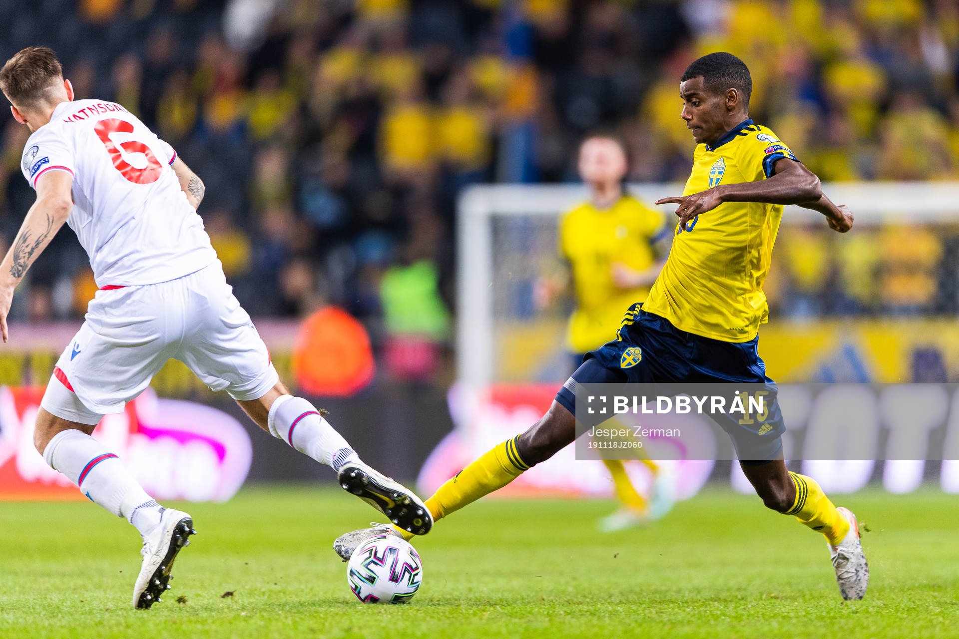 Heini Vatnsdal of Faroe Islands and Alexander Isak of
