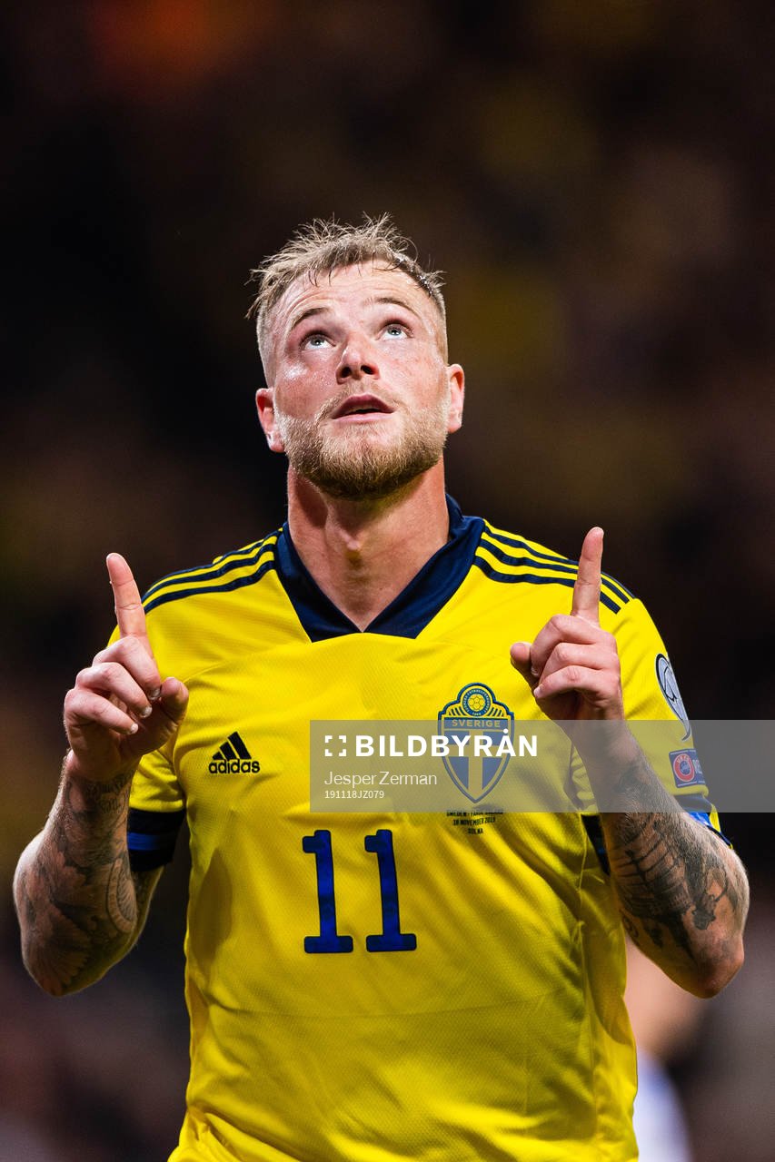 John Guidetti of Sweden celebrates scoring 3-0