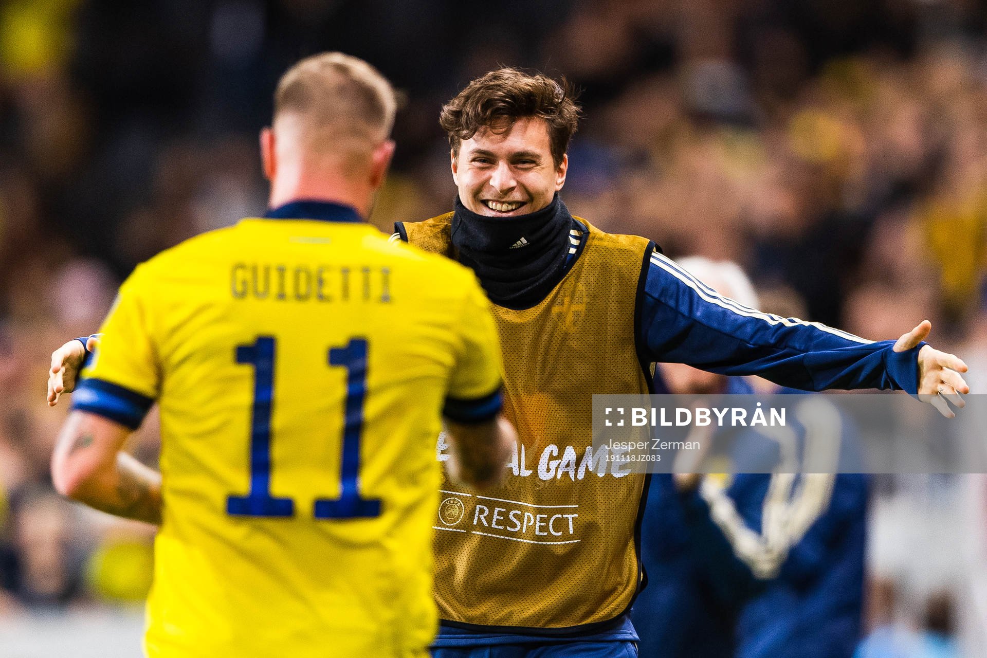 John Guidetti of Sweden celebrates scoring 3-0 and hugs
