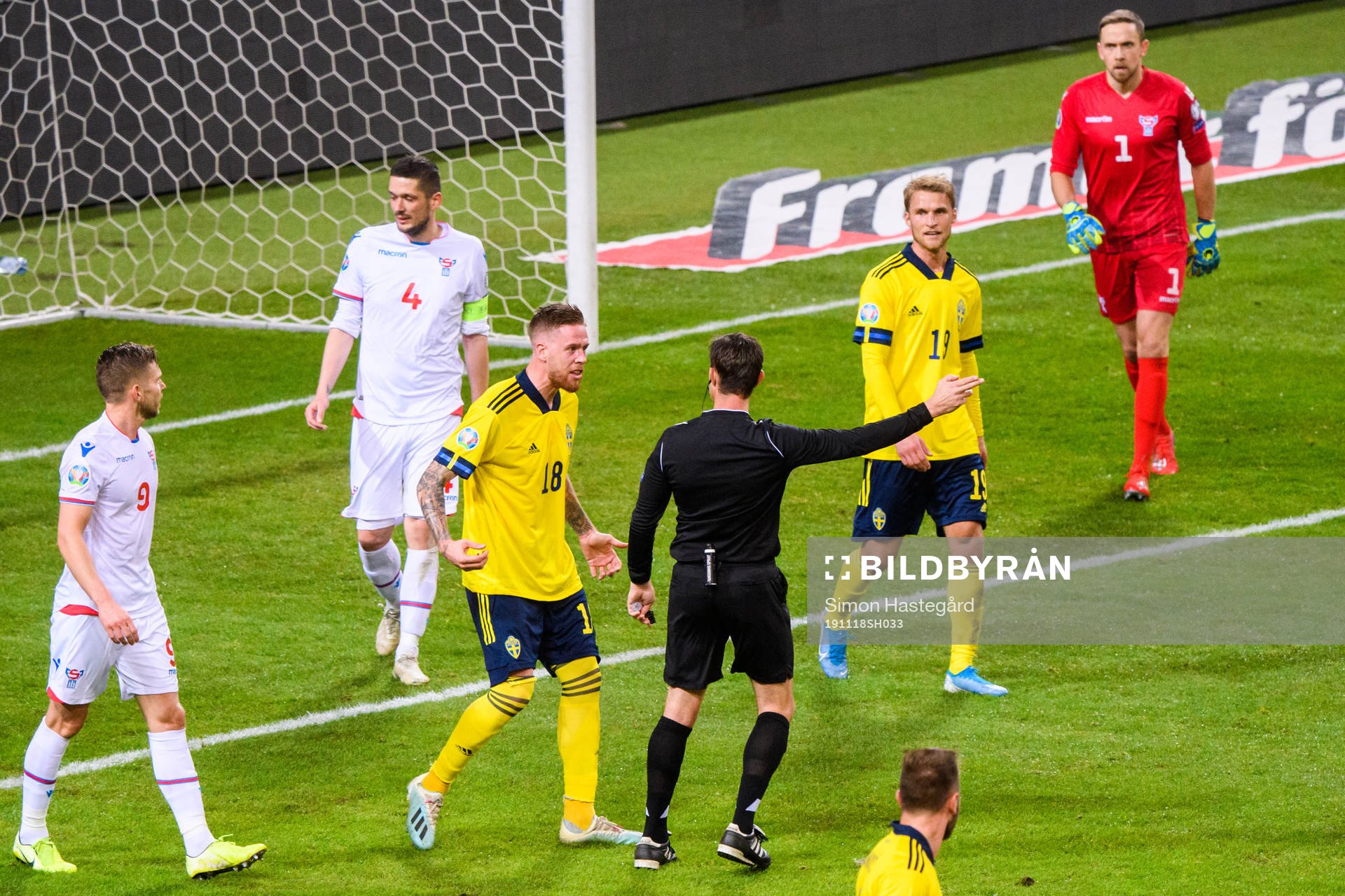 Pontus Jansson of Sweden reacts against referee Matej Jug