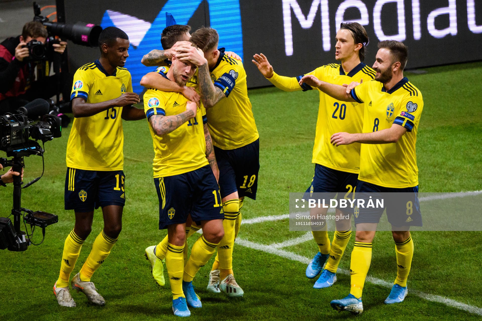 John Guidetti of Sweden celebrate with teammates