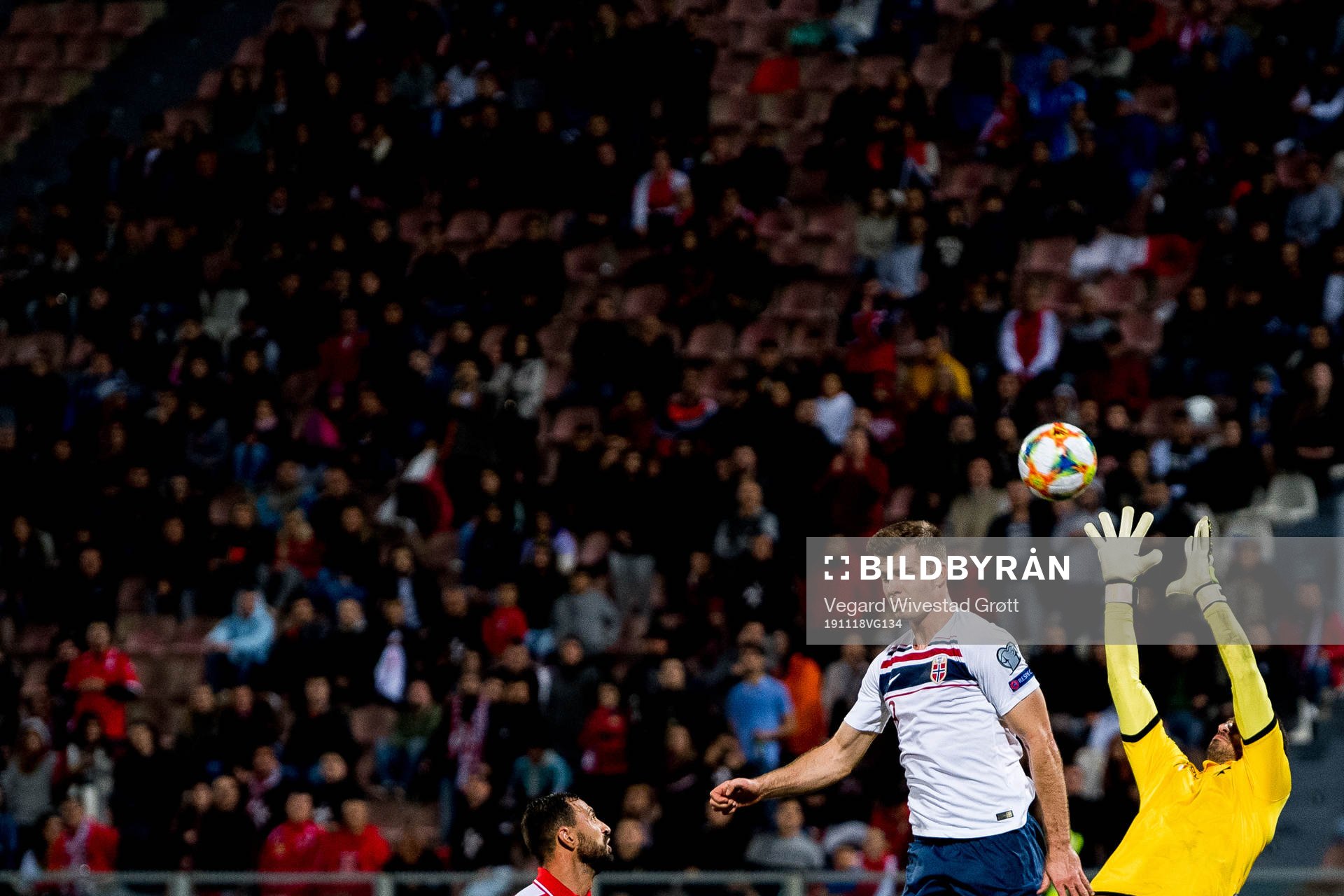 Alexander Sørloth of Norway and goalkeeper Henry Bonello