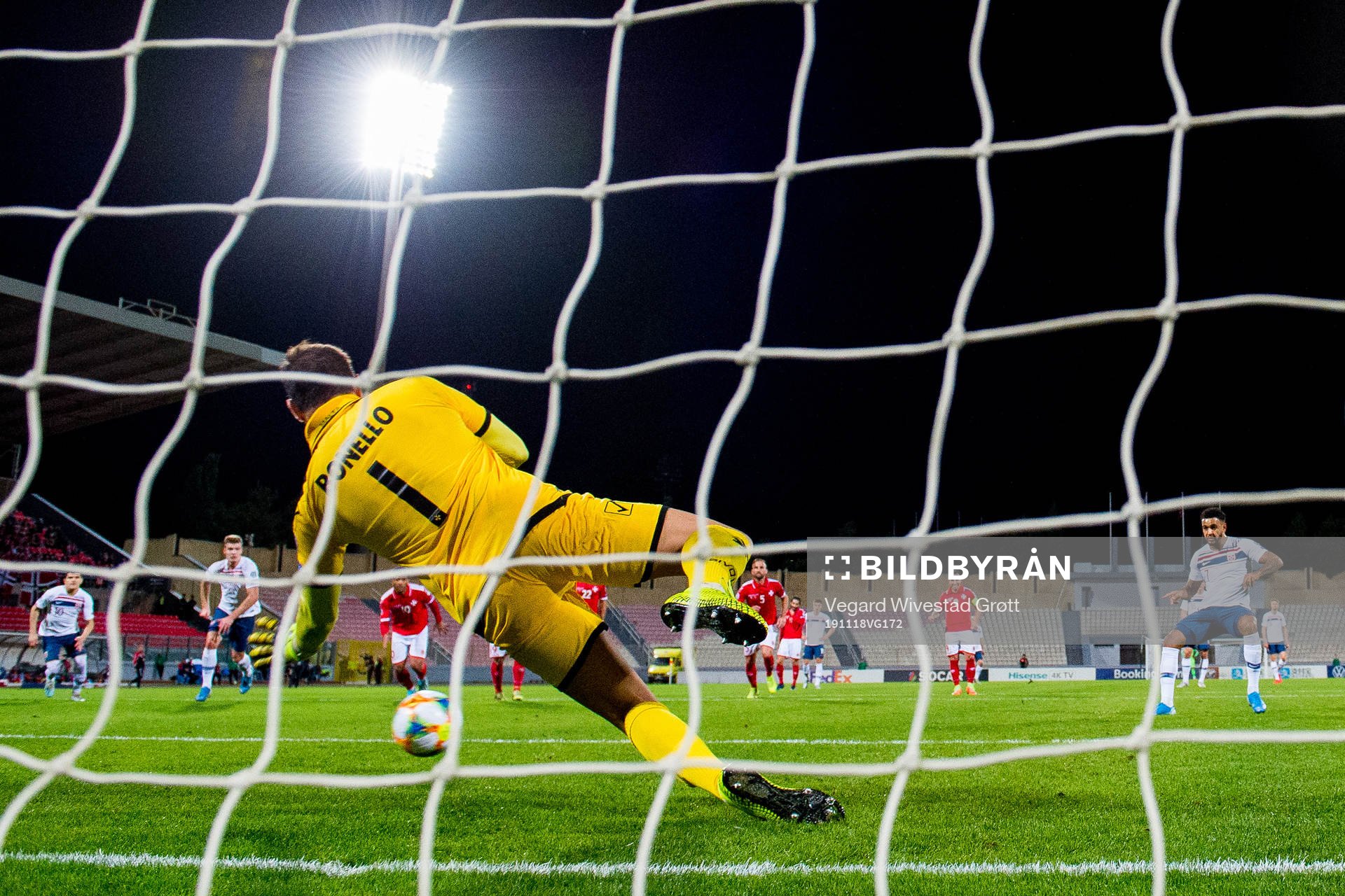 Goalkeeper Henry Bonello of Malta saves a penalty kick from