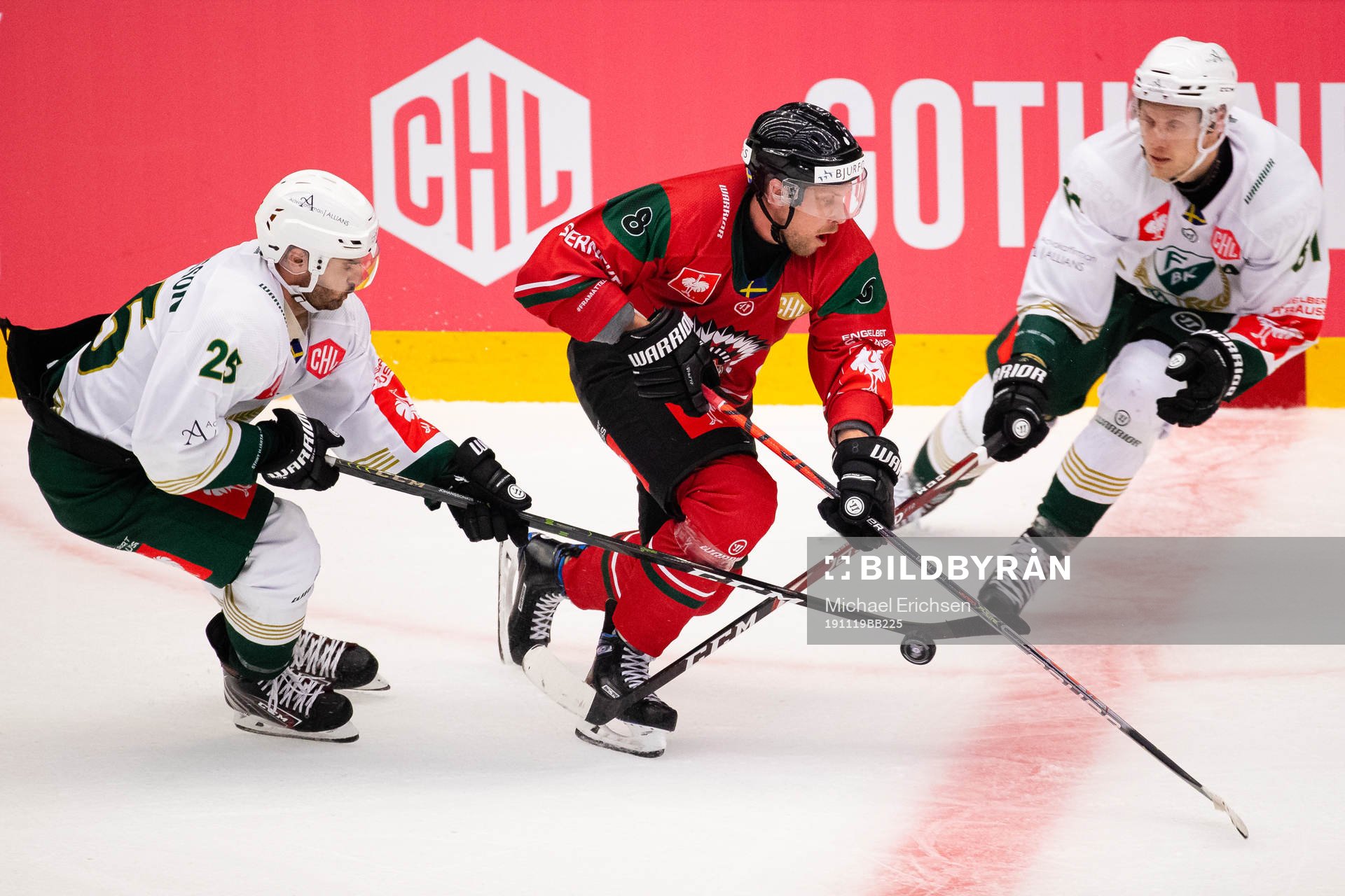 Martin Johansson and Johan Ryno of Färjestad and Viktor