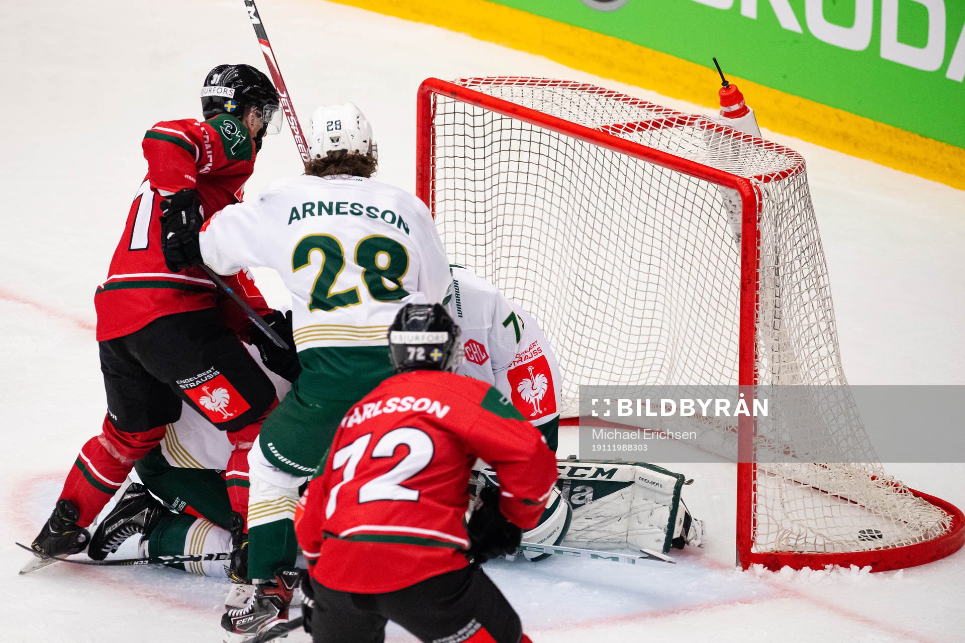 Nicklas Lasu of Frölunda scores 6-2 behind goalkeeper