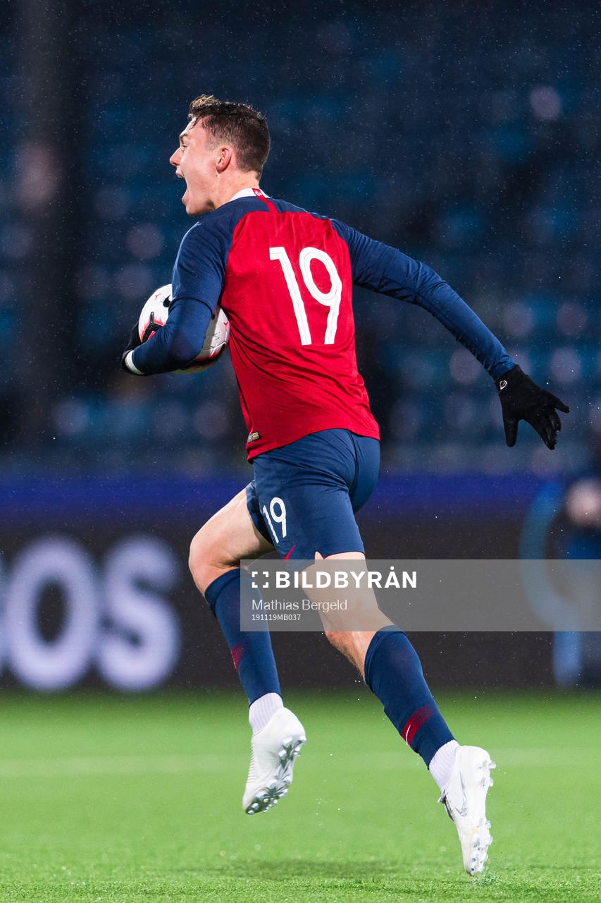 Jørgen Larsen of Norway celebrates scoring 2-3