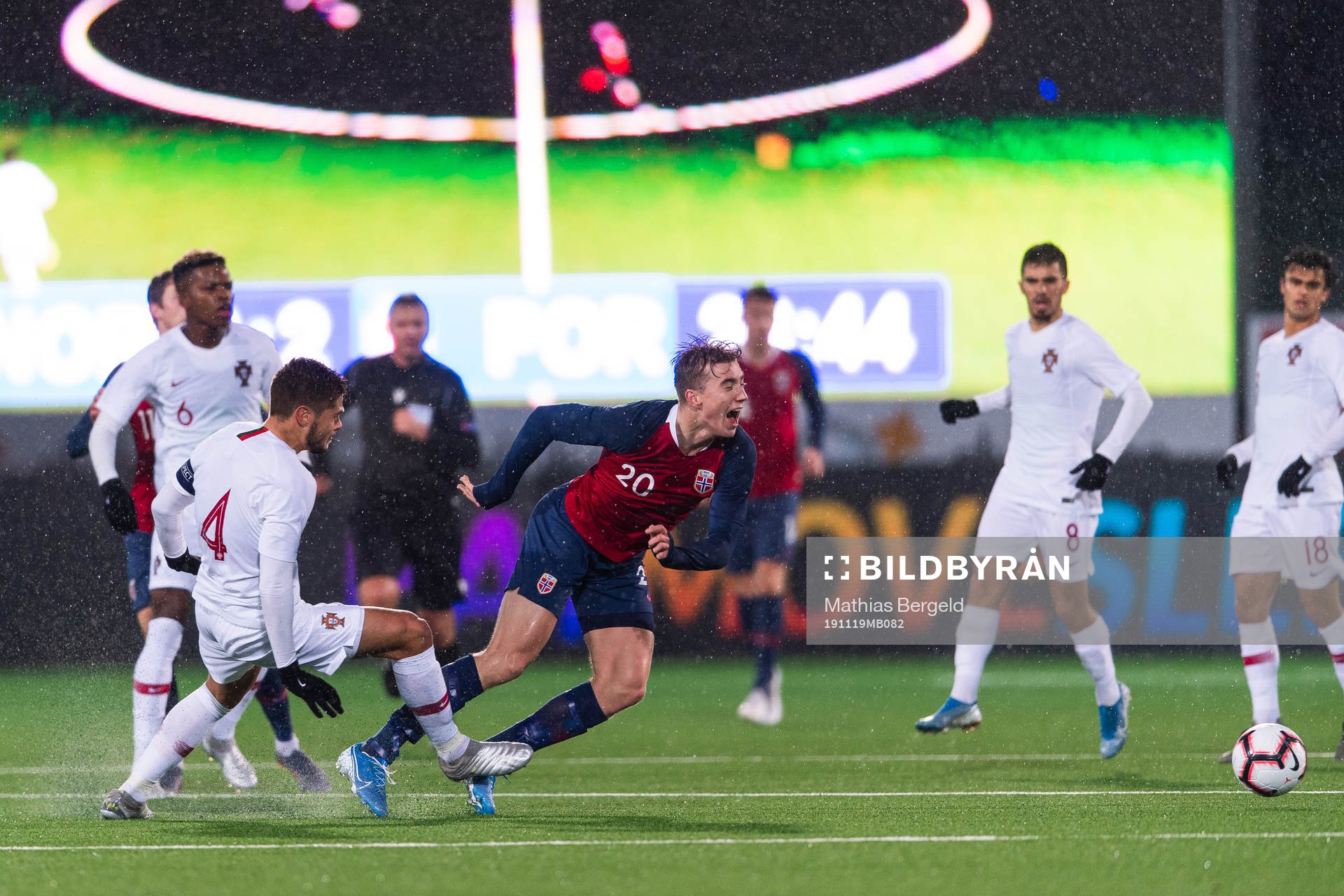 Diogo Queiros of Portugal tackles Kristian Thorstvedt of