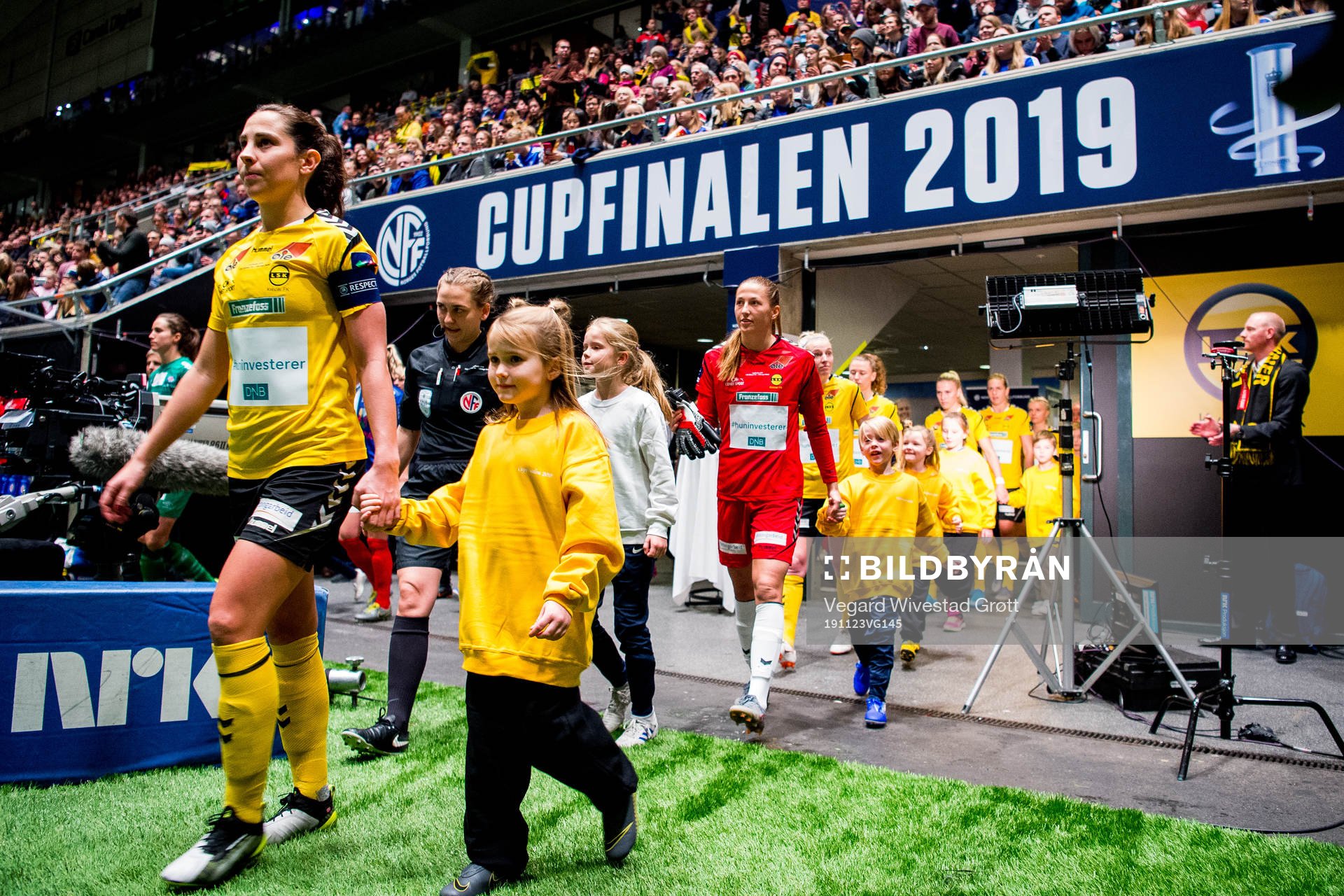 Ingrid Moe Wold and goalkeeper Cecilie Fiskerstrand of LSK