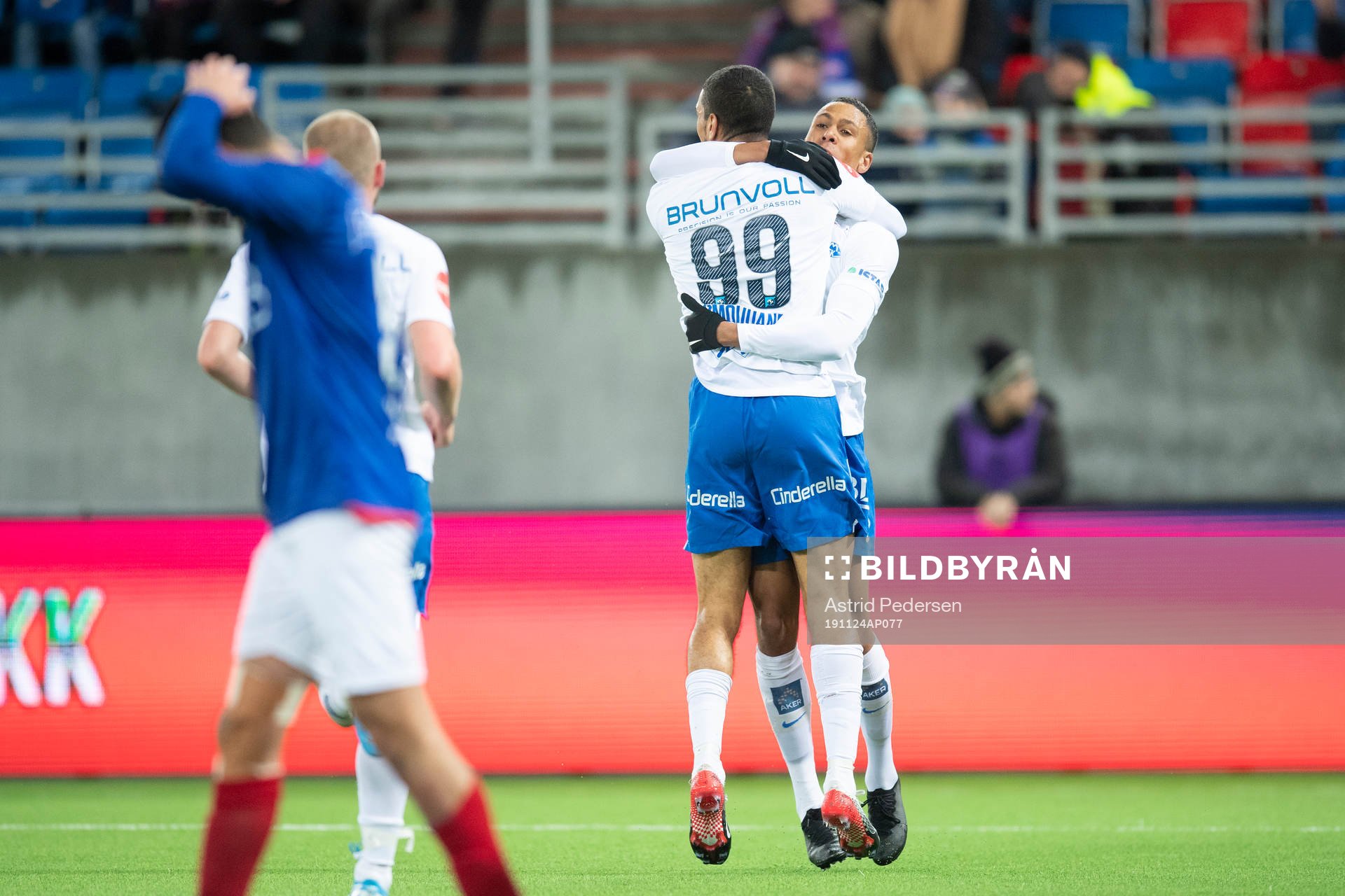 Mathis Bolly of Molde celebrate with Ohi Omoijuanfo