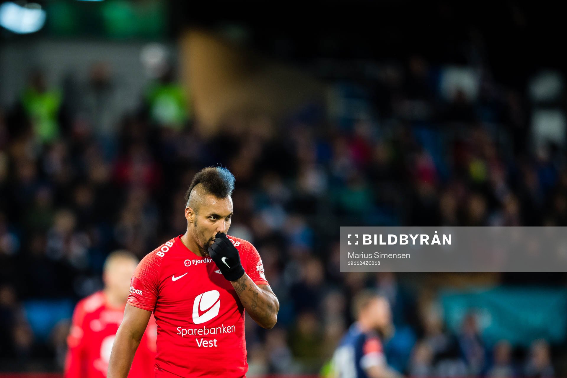Bismar Gilberto Acosta Evans of Brann looks dejected