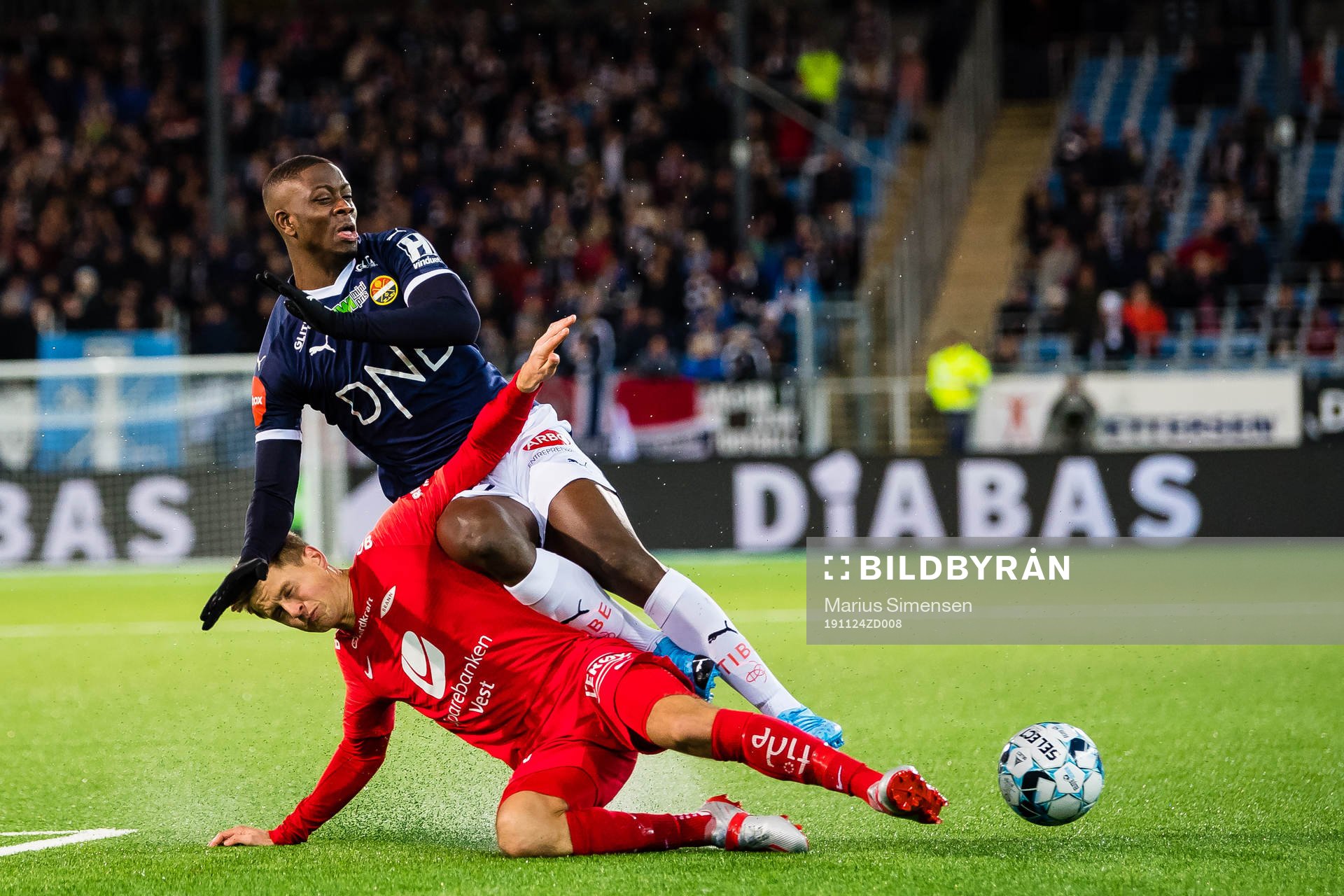 Prosper Mendy of Strømsgodset and Thomas Grøgaard of Brann