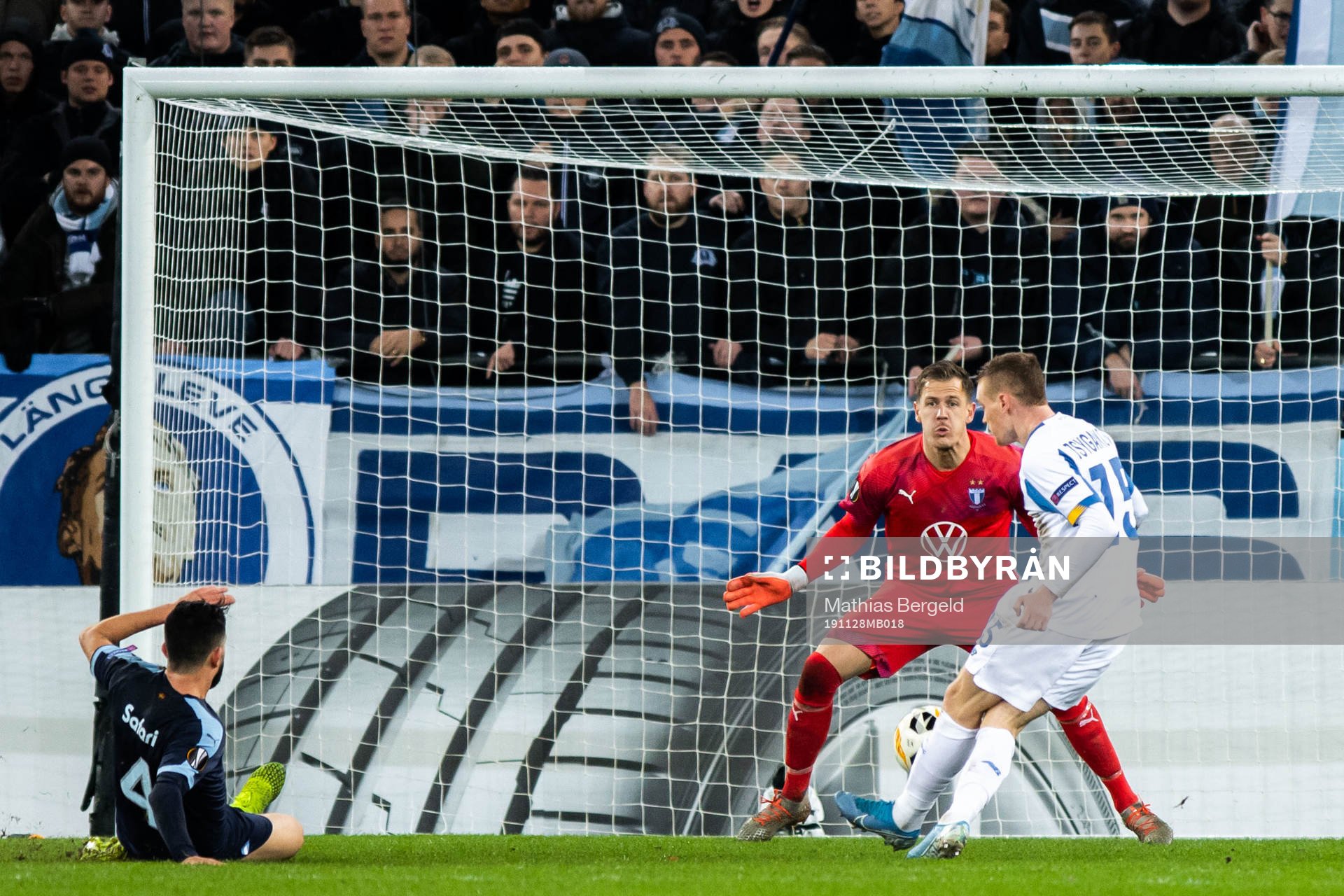 Viktor Tsyganov of Dynamo Kiev scores 1-2 behind goalkeeper