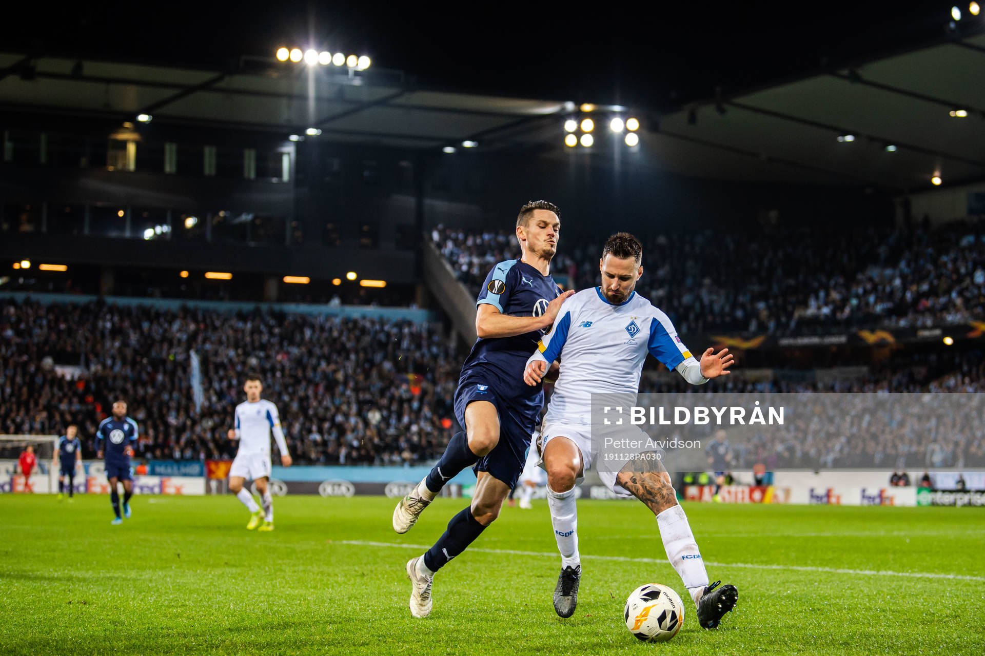 Markus Rosenberg of Malmö FF and Tamas Kadar of Dynamo Kiev