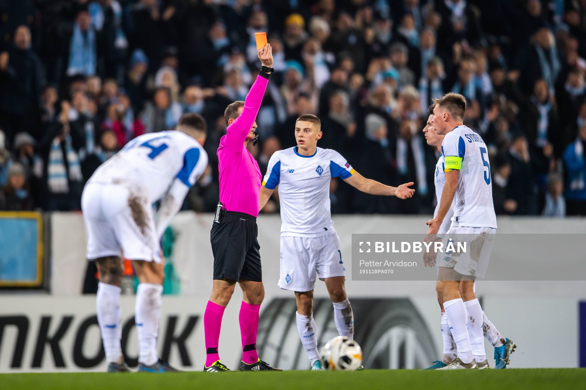 Serhiy Sydorchuk of Dynamo Kiev is shown a red card from