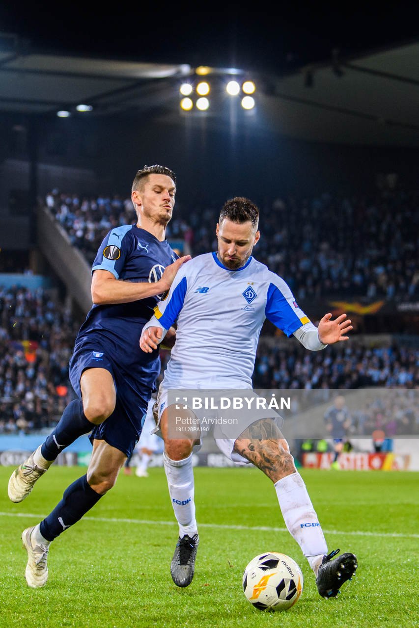 Markus Rosenberg of Malmö FF and Tamas Kadar of Dynamo Kiev