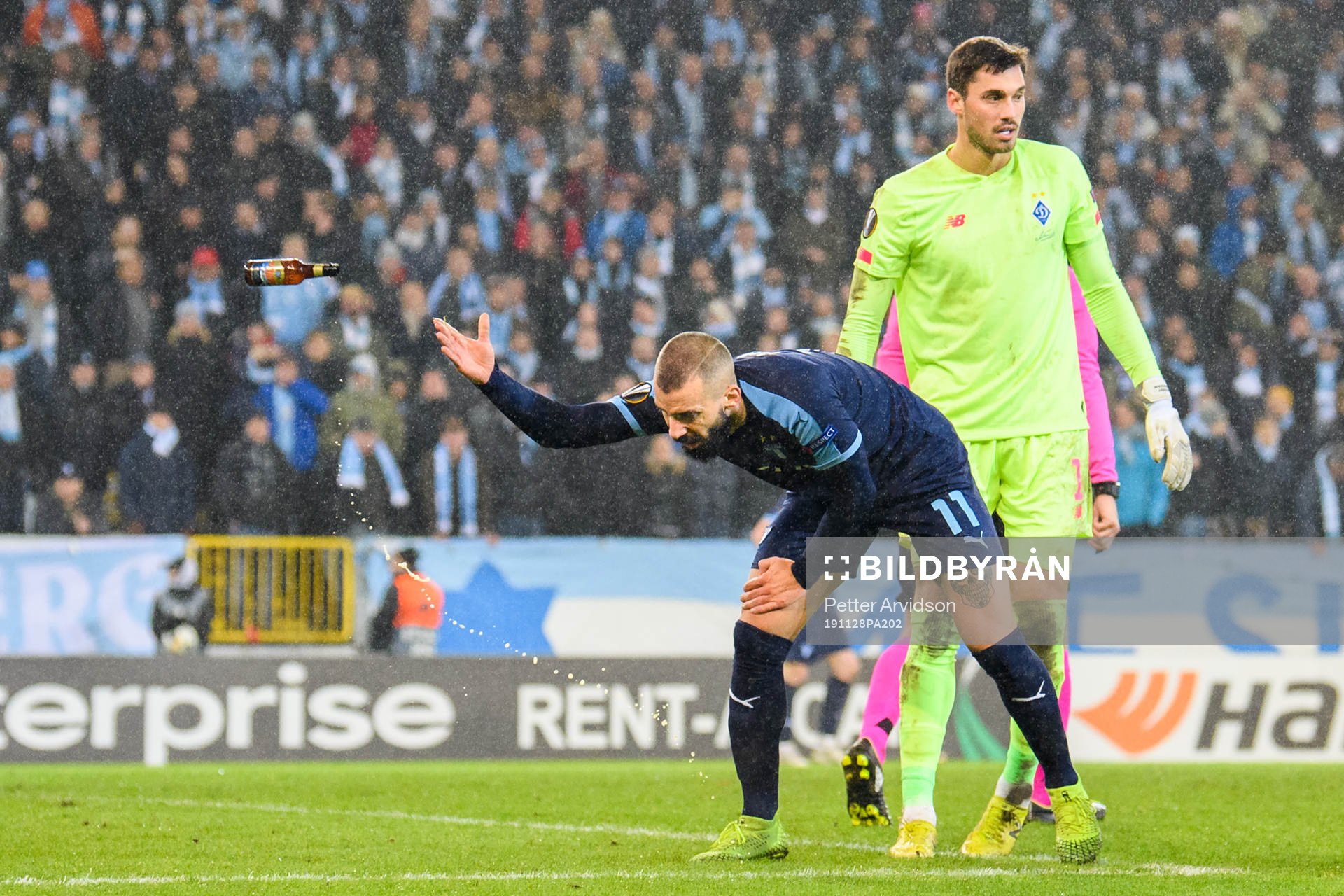 Guillermo Molins of Malmö FF tosses a bottle that has been