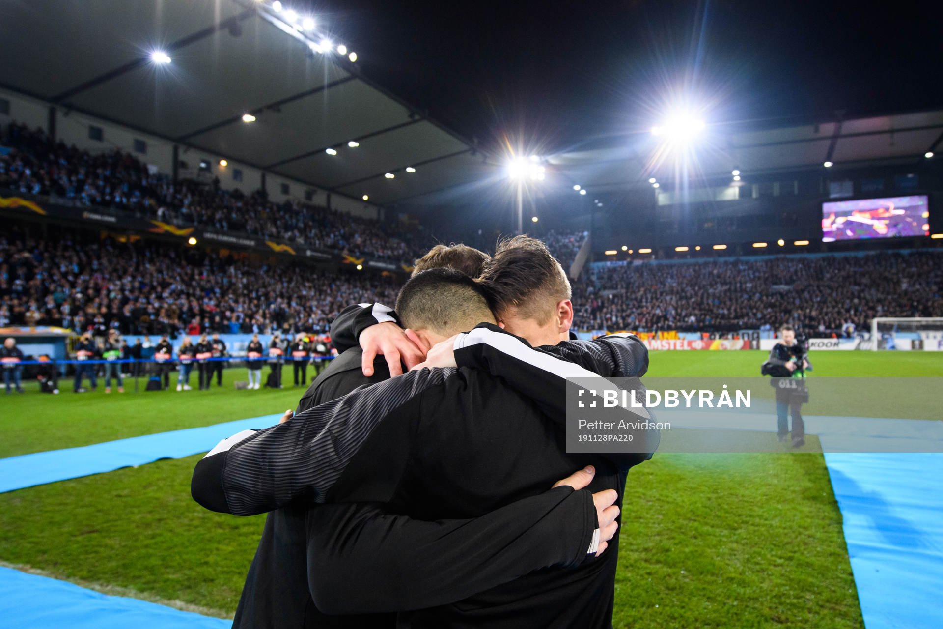 Markus Rosenberg of Malmö FF hugs Johan Dahlin and Behrang