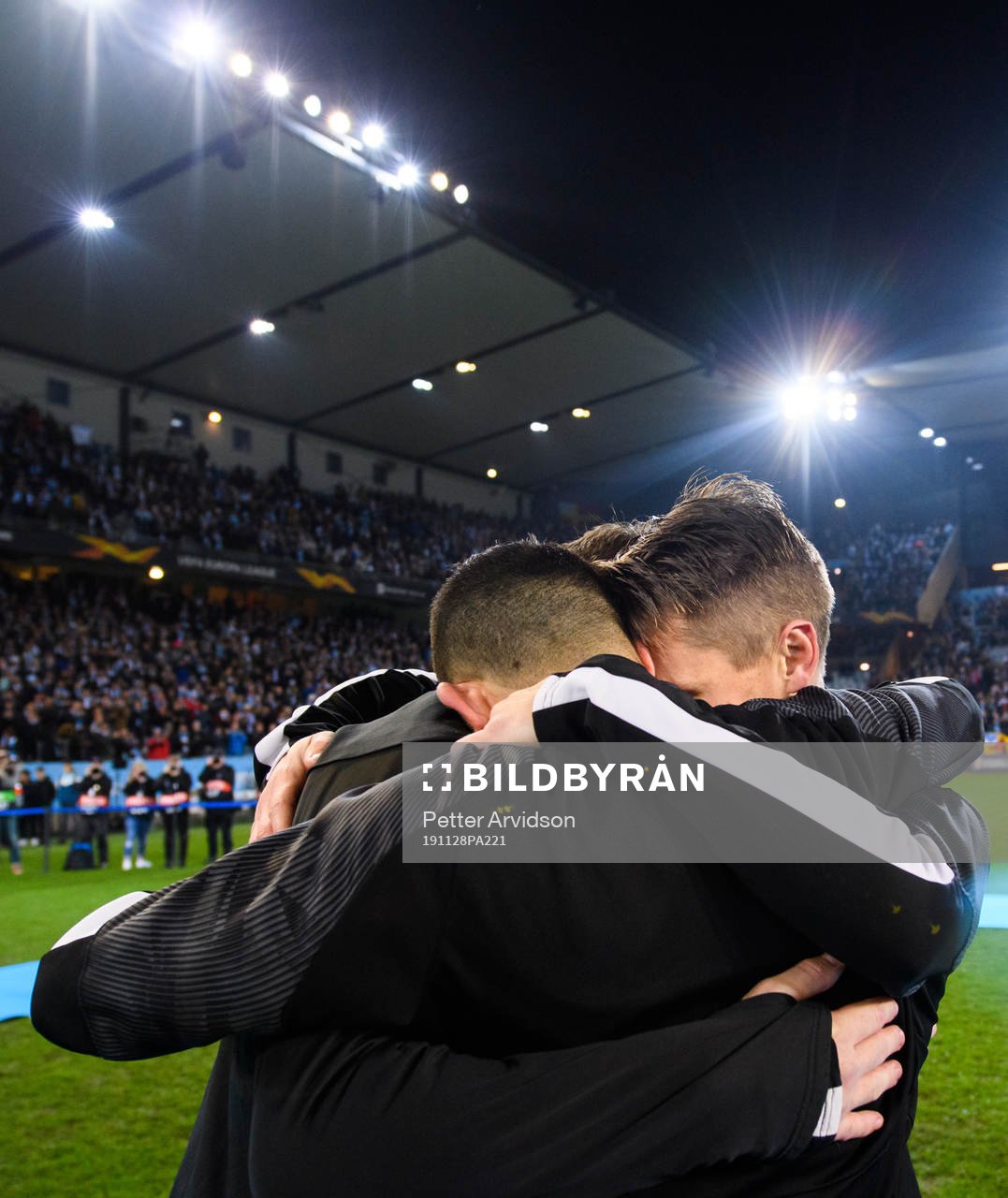 Markus Rosenberg of Malmö FF hugs Johan Dahlin and Behrang