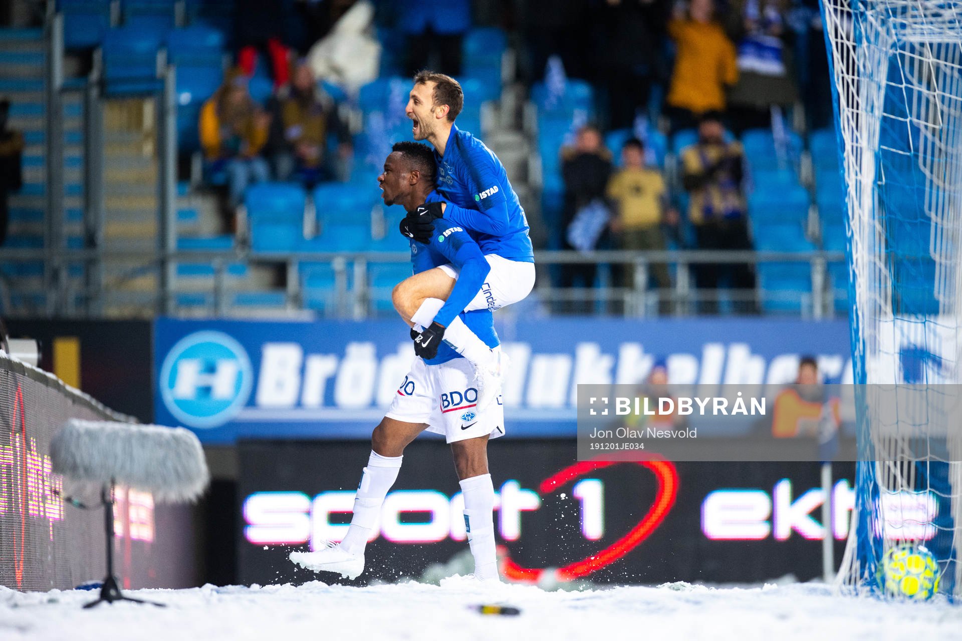 Leke Samson James and Magnus Eikrem of Molde celebrate the