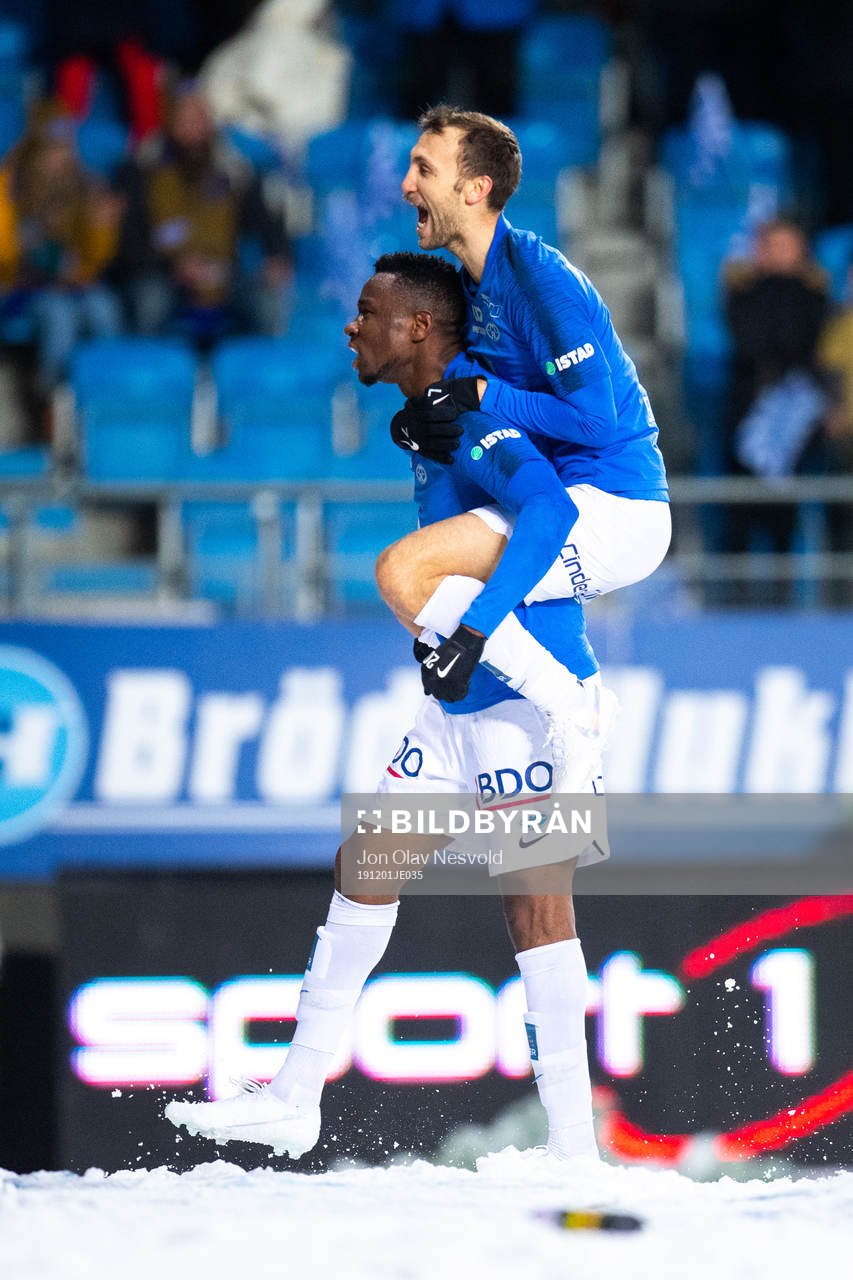Leke Samson James and Magnus Eikrem of Molde celebrate the