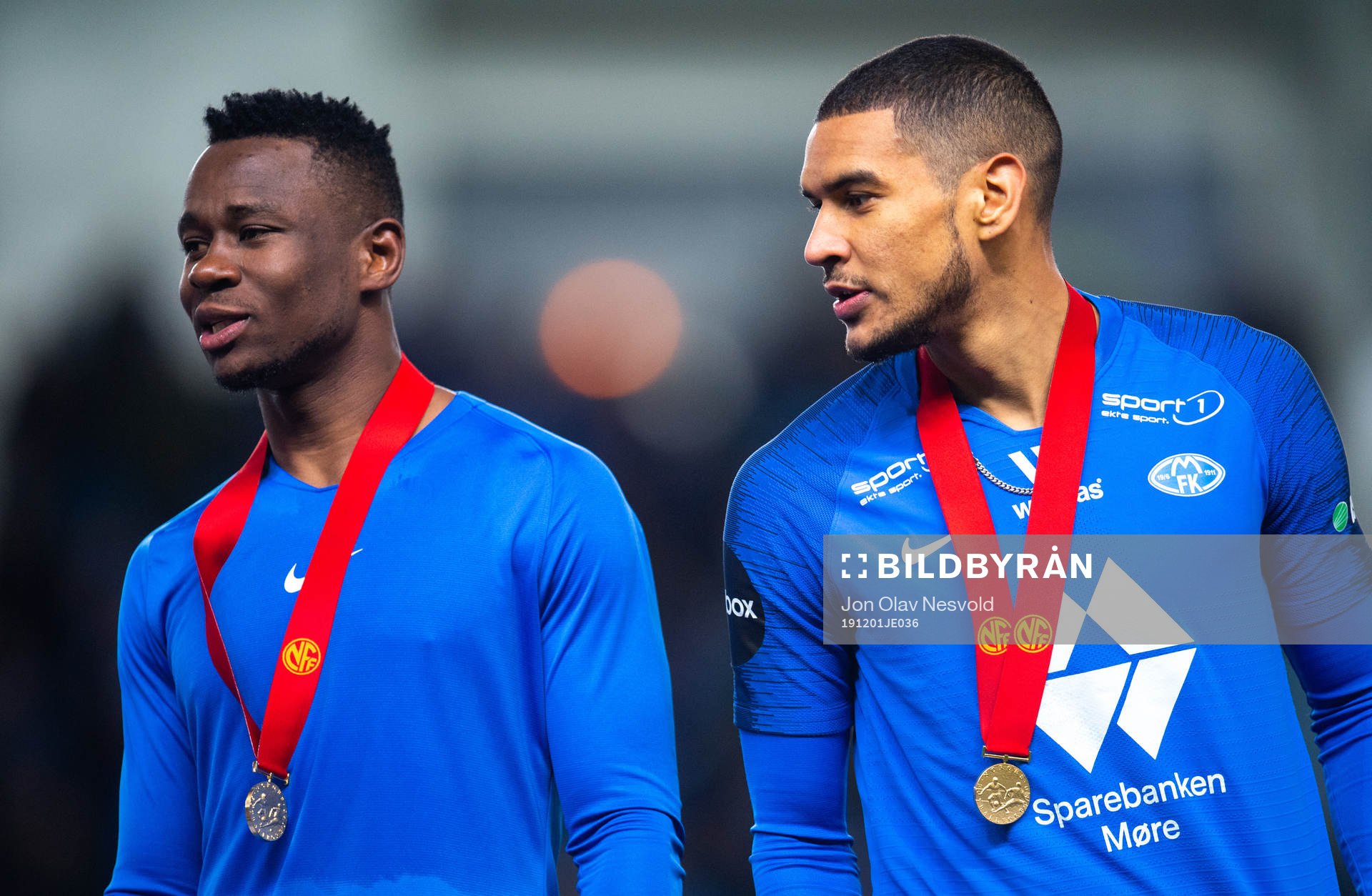 Leke Samson James and Ohi Omoijuanfo of Molde with their gold medal after the Eliteserien match between Molde and Bodø/Glimt on December 1, 2019 in Molde.
