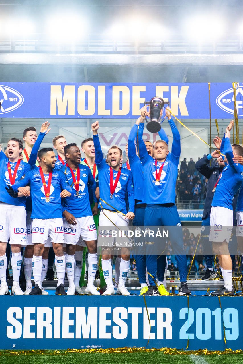 Players of Molde celebrate with the trophy