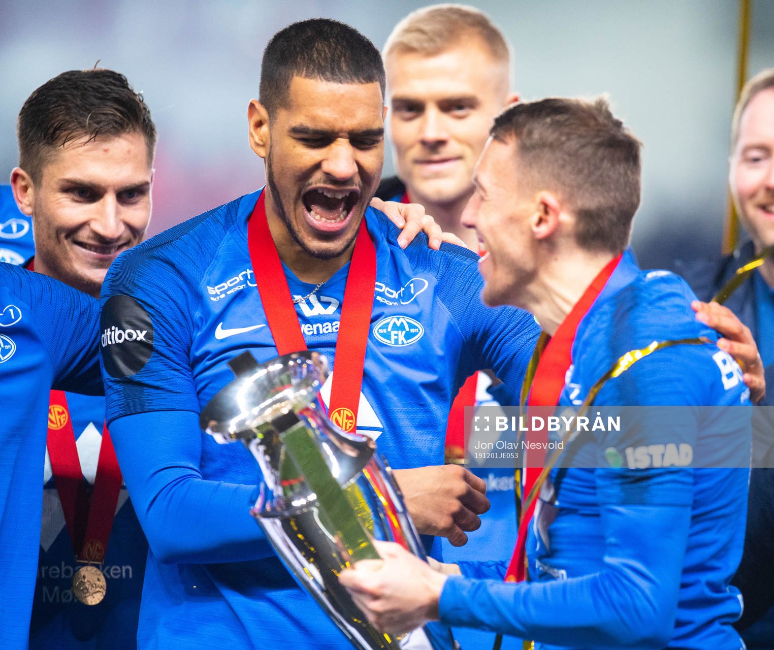 Ohi Omoijuanfo and Mattias Moström of Molde celebrate with