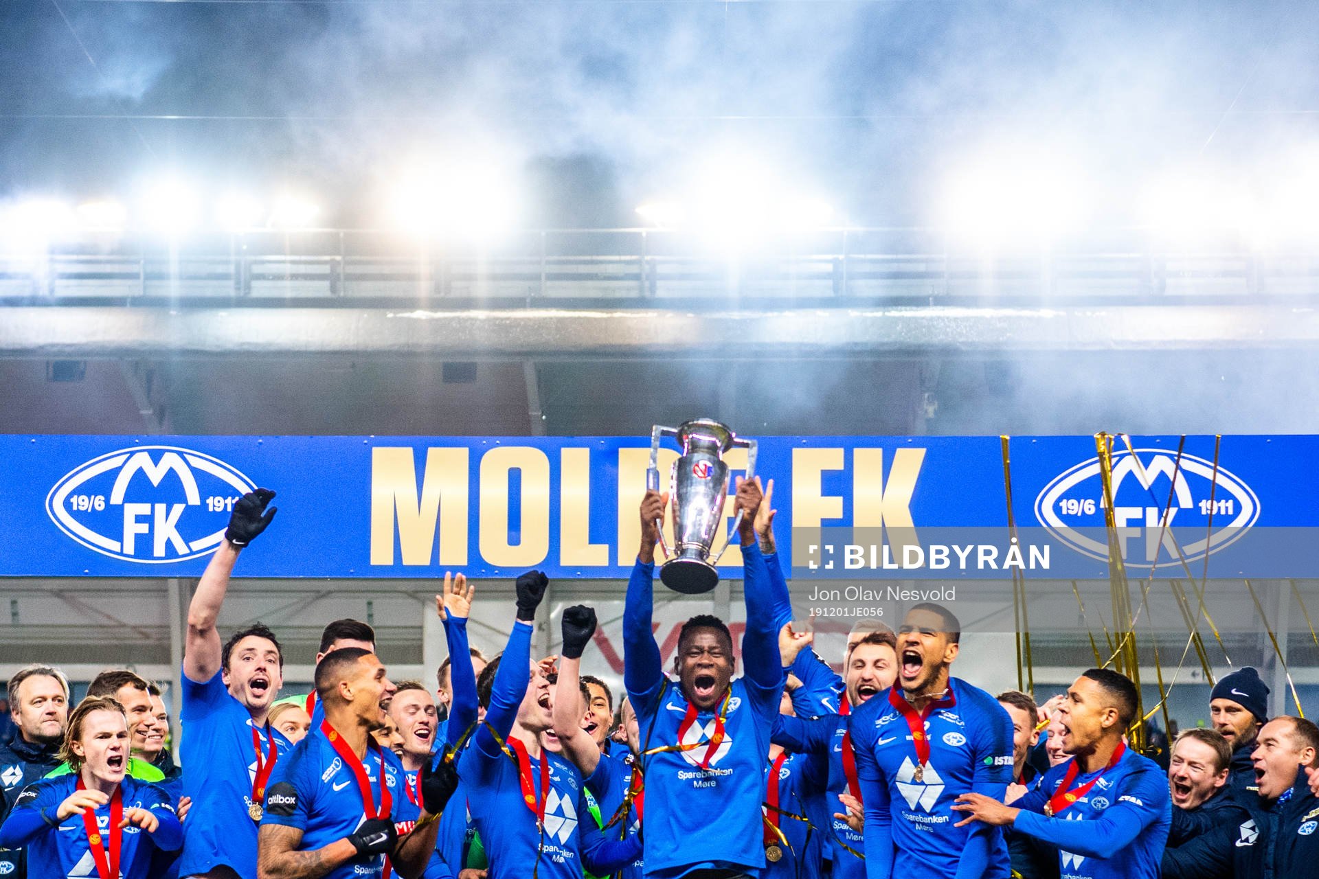 Players of Molde celebrate with the trophy