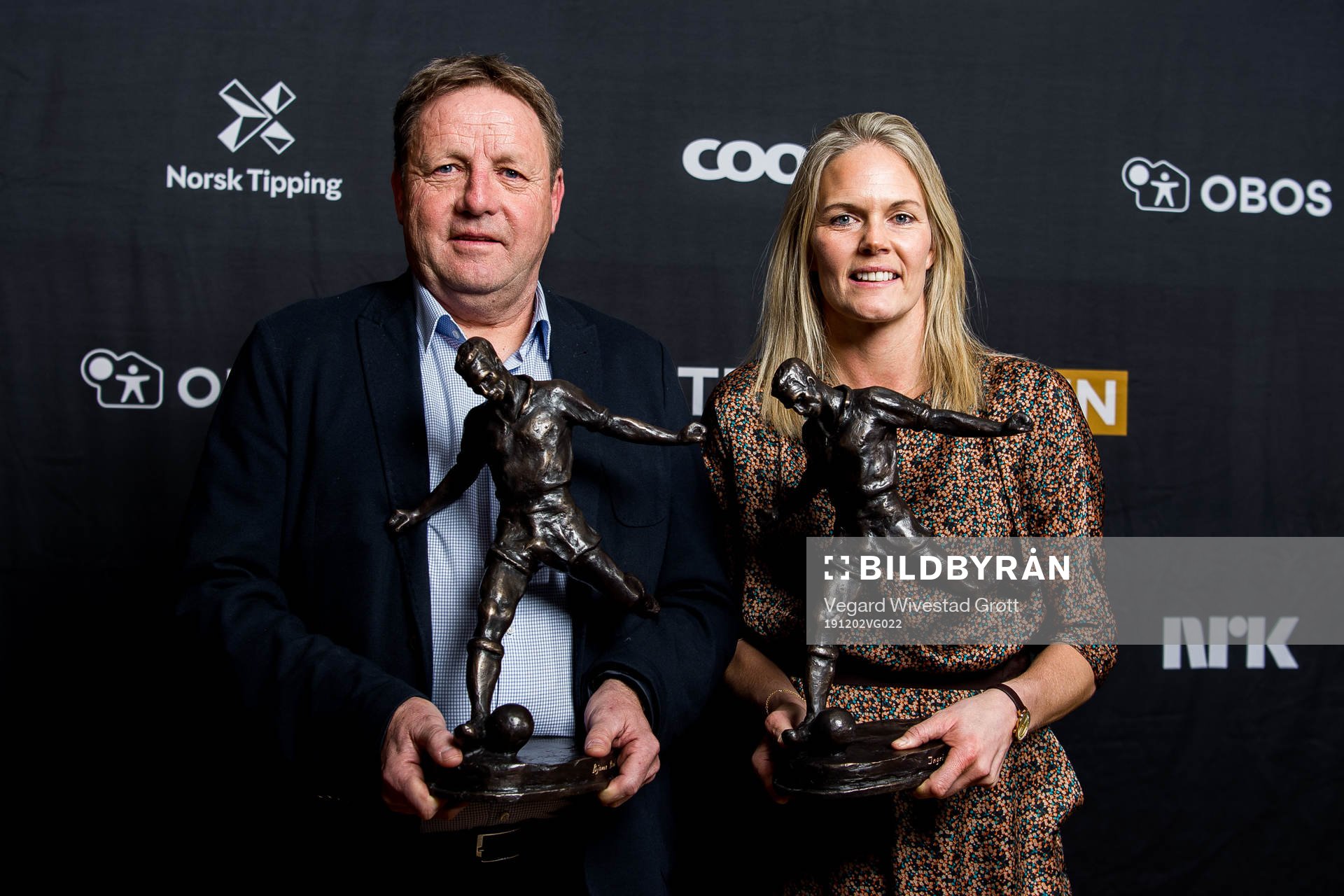 Bjarne Berntsen and Ingrid Hjelmseth pose for a portrait with the awards Kniksens Hederspris during Fotballfesten on December 2, 2019 in Oslo.