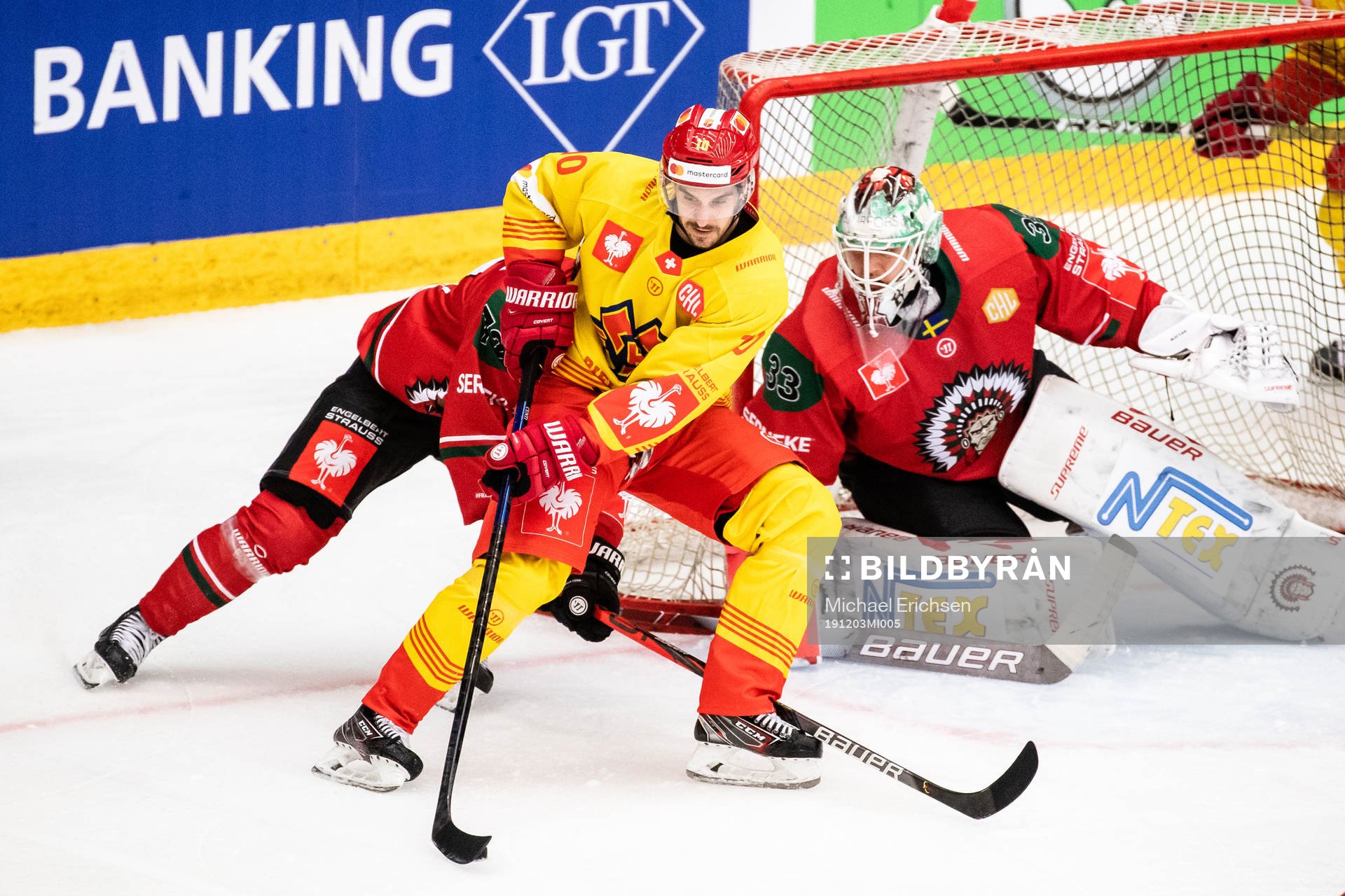 Luca Cunti of Biel-Bienne and goalkeeper Johan Mattsson of