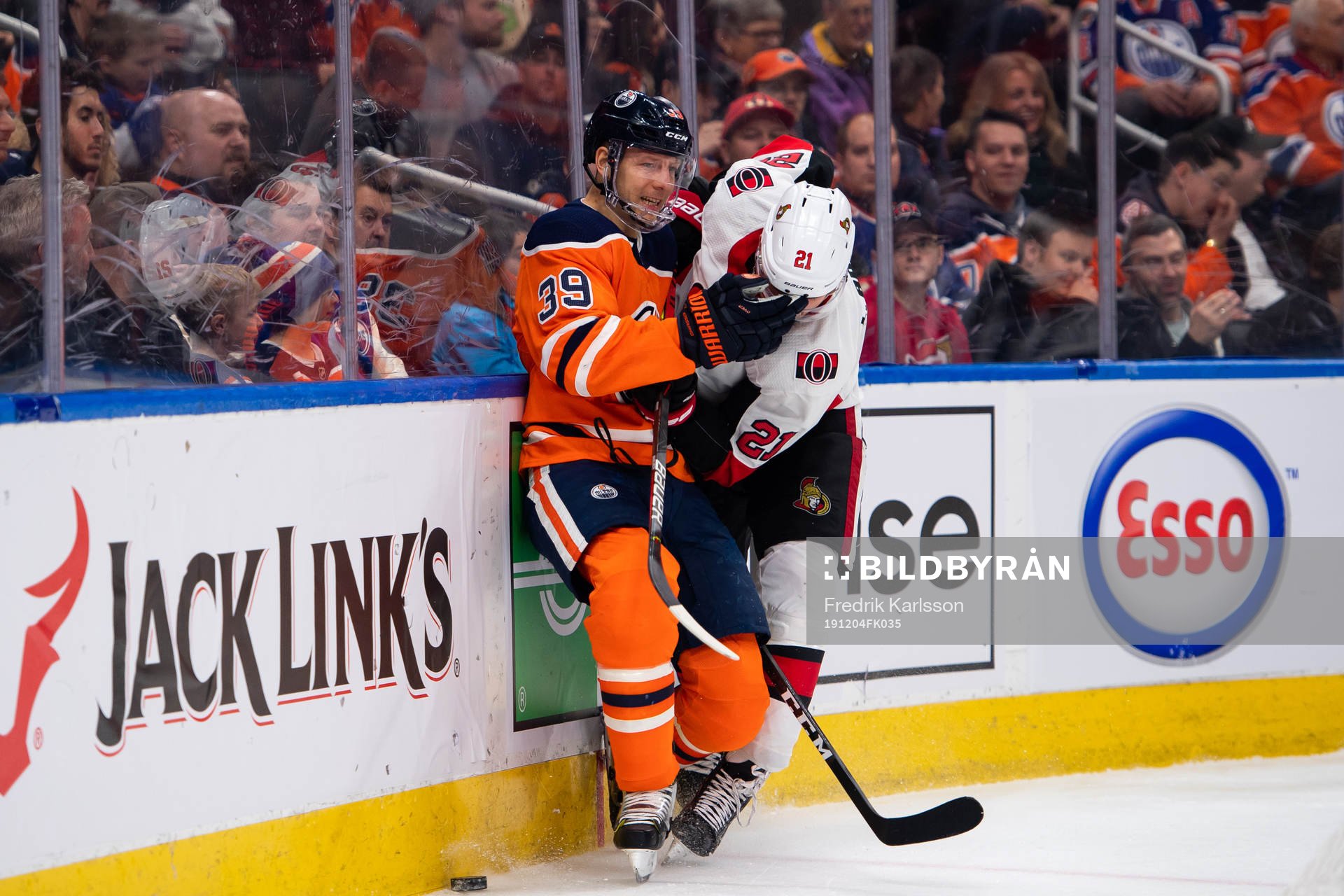 Alex Chiasson of the Edmonton Oilers and Logan Brown of the