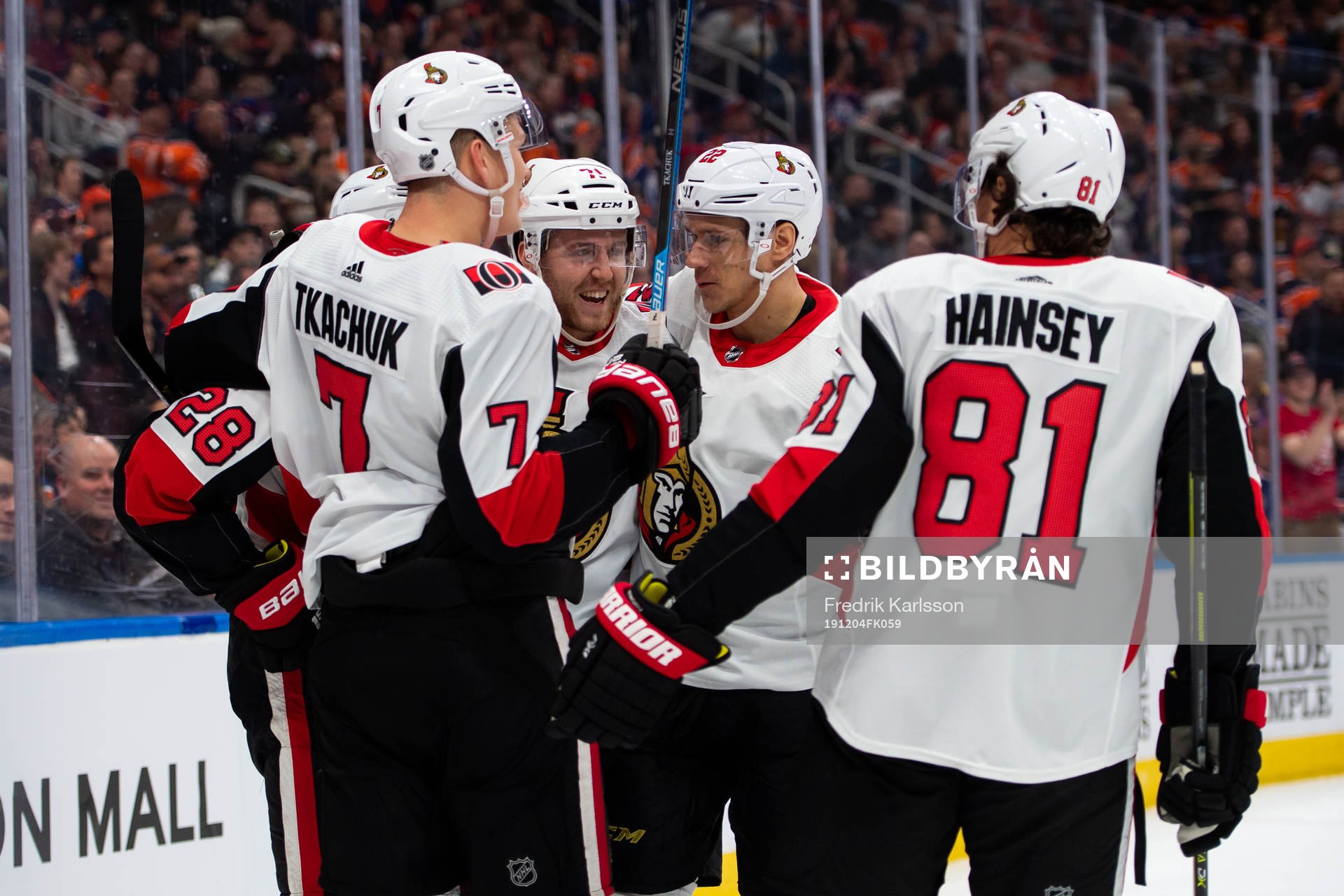 Chris Tierney and Nikita Zaitsev of the Ottawa Senators