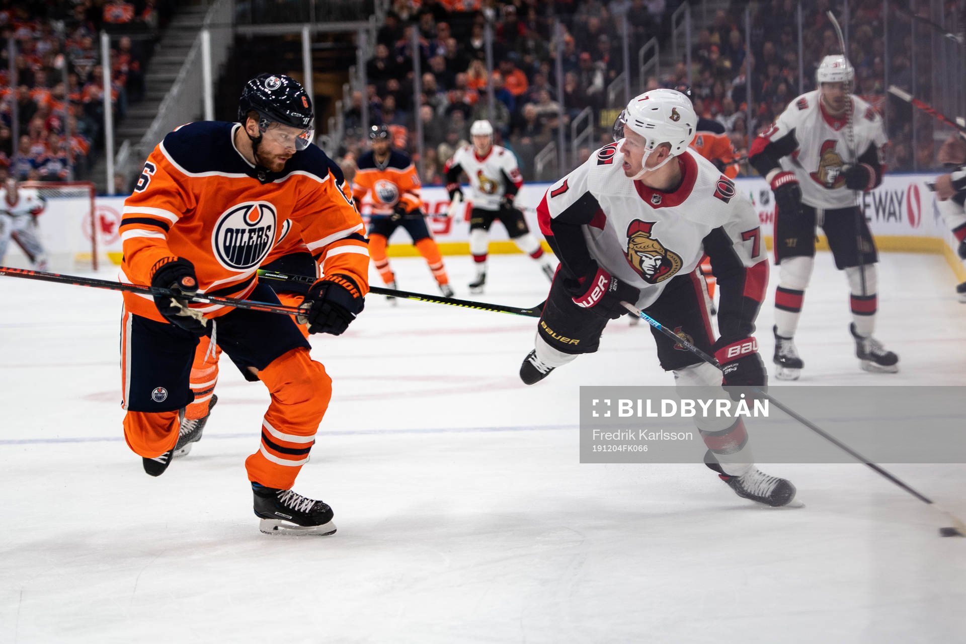 Adam Larsson of the Edmonton Oilers and Brady Tkachuk of