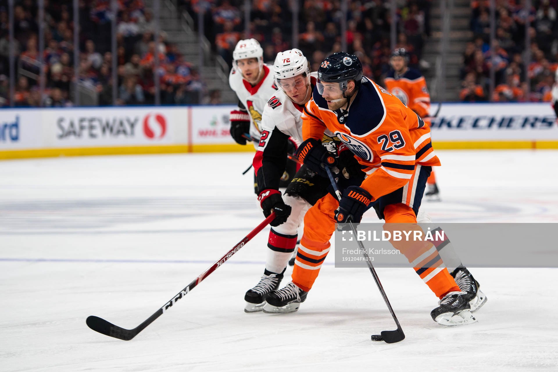 Thomas Chabot of the Ottawa Senators  and Leon Draisaitl of