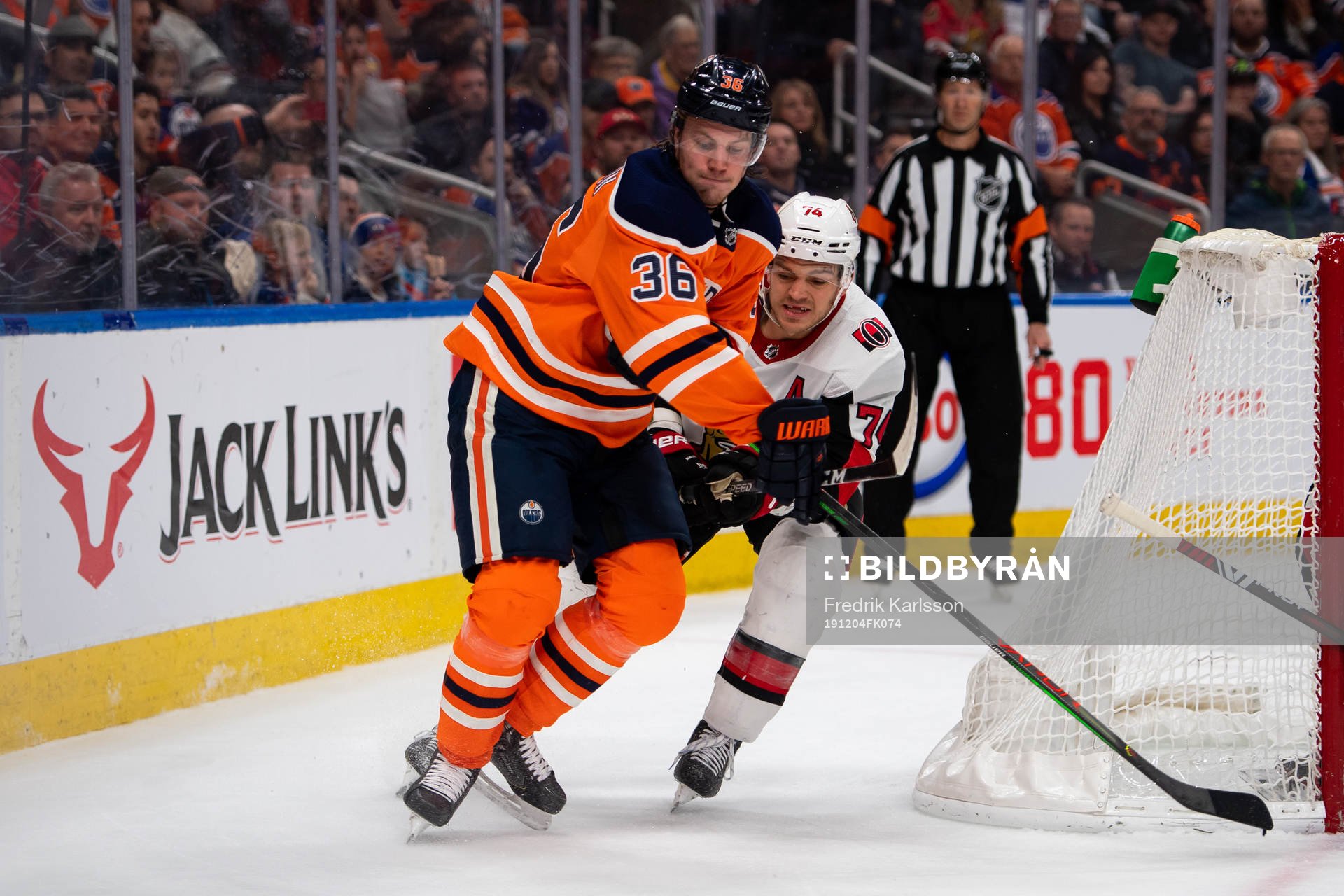 Joel Persson of the Edmonton Oilers and Mark Borowiecki of