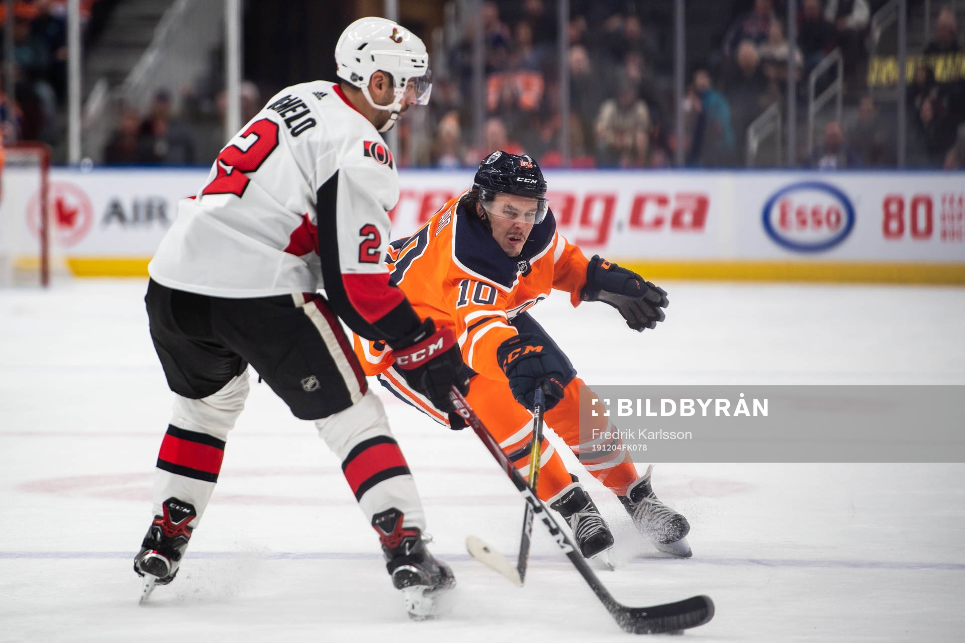 Dylan DeMelo of the Ottawa Senators  and Joakim Nygard of