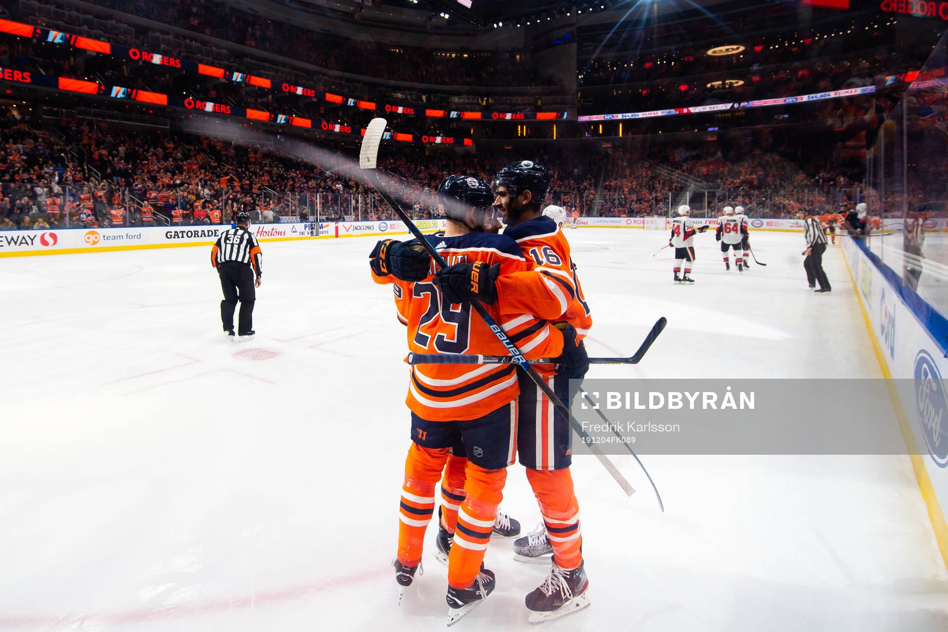 Leon Draisaitl and Jujhar Khaira of the Edmonton Oilers