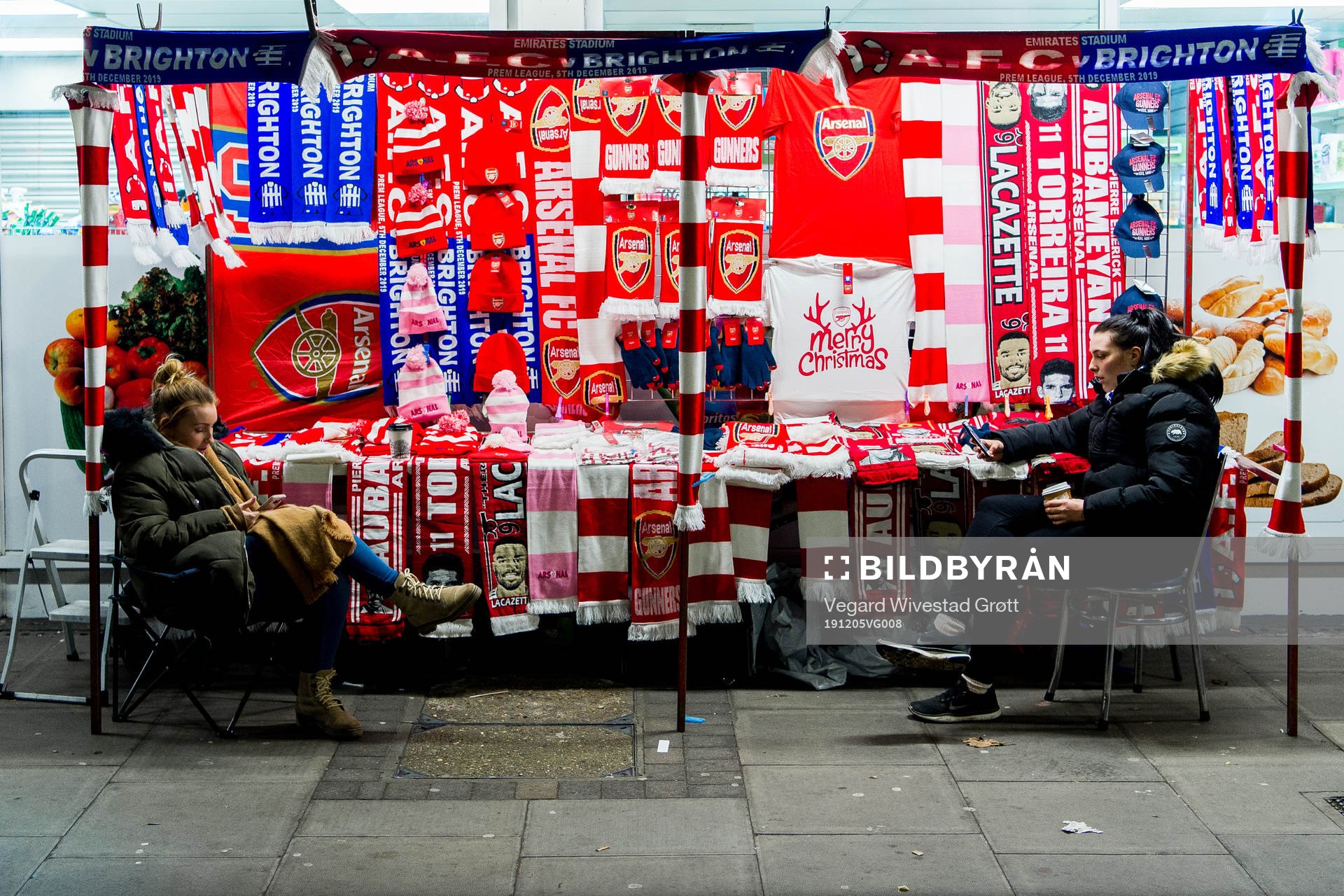 Arsenal scarfs being sold outside the stadium