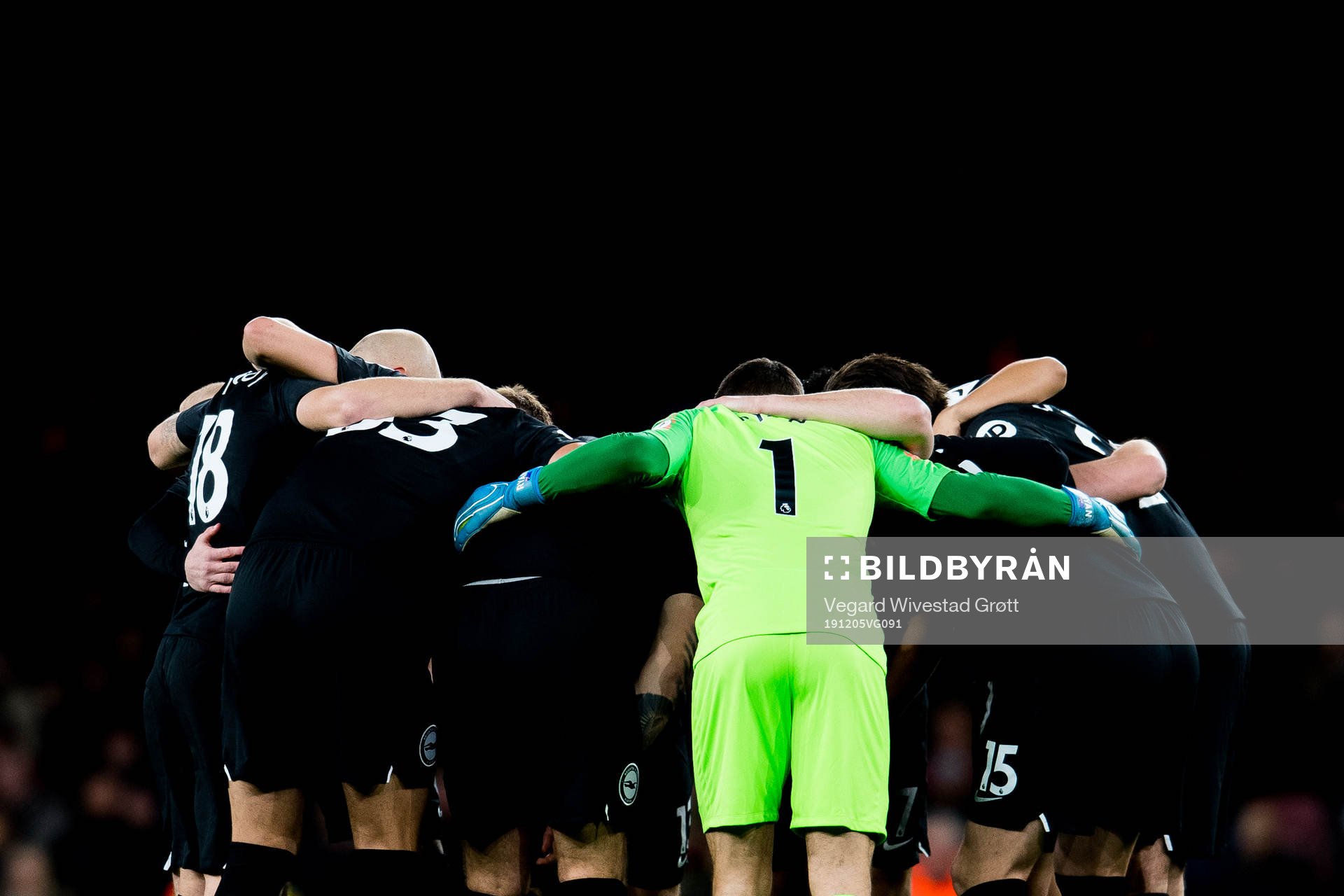 Goalkeeper Mathew Ryan and the players of Brighton gather