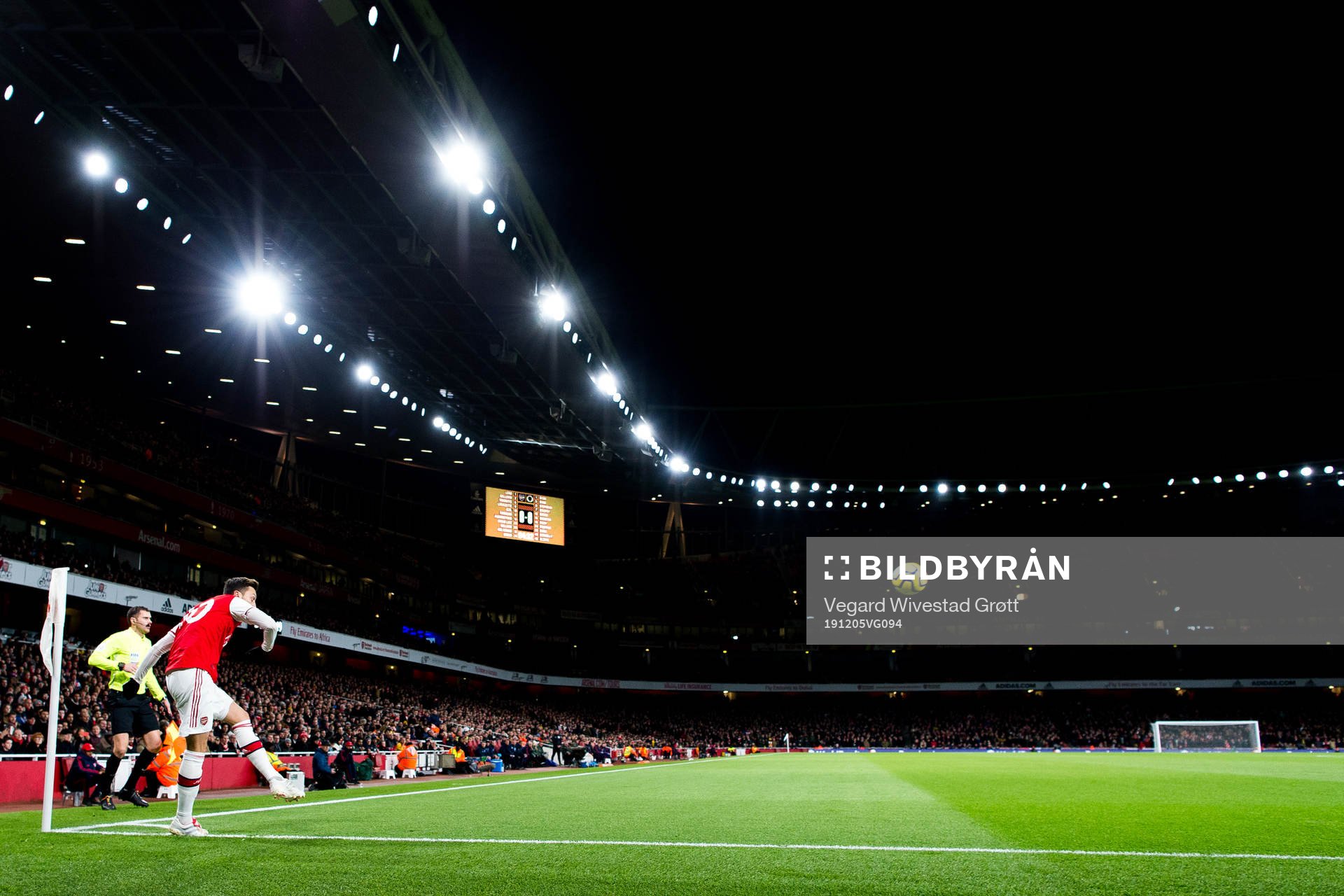 Mesut Özil of Arsenal takes a corner kick