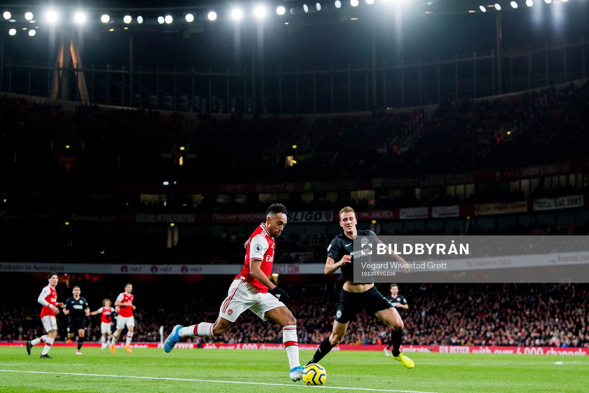 Pierre-Emerick Aubameyang of Arsenal and Dan Burn of
