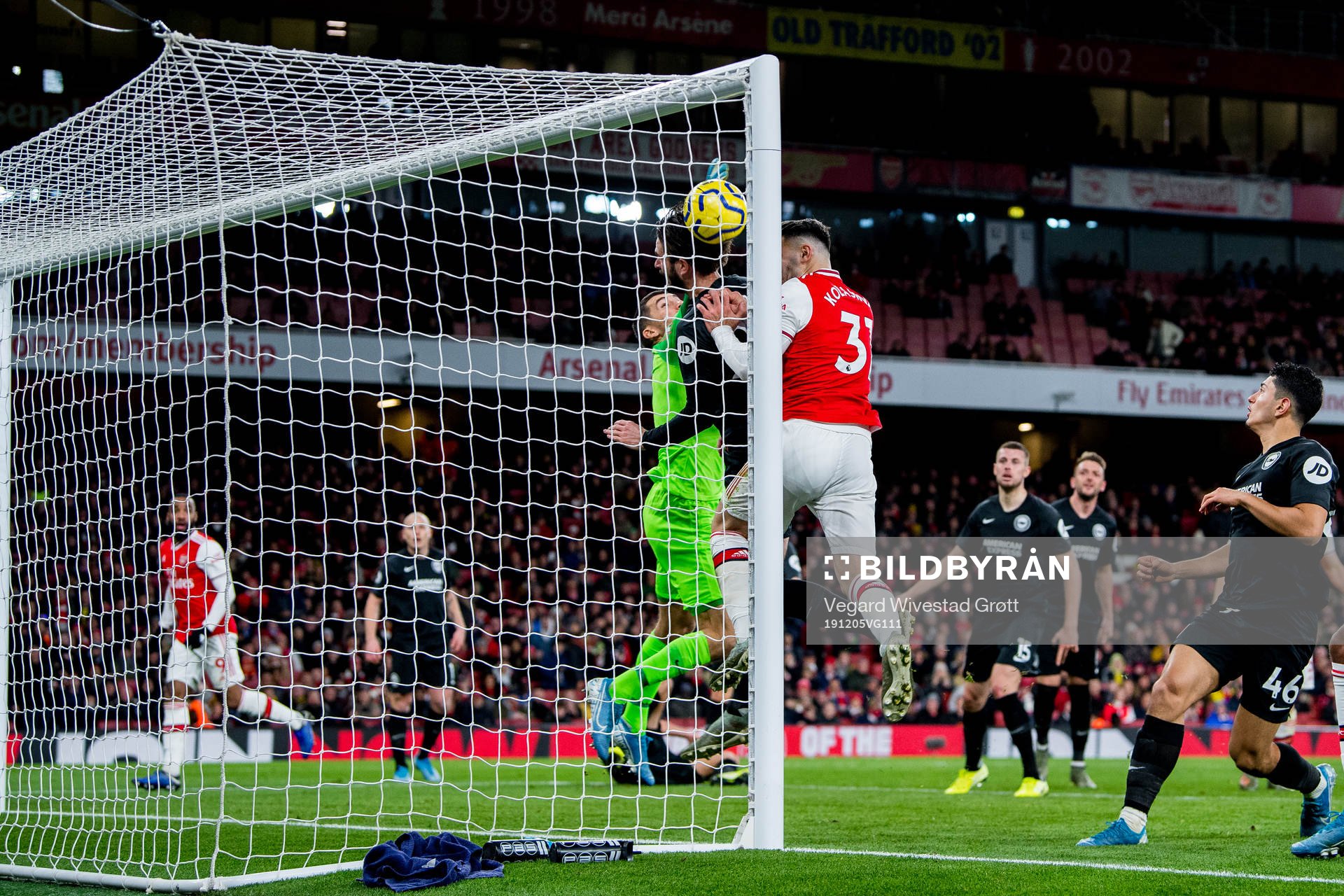Goalkeeper Mathew Ryan of Brighton and Sead Kolasinac of