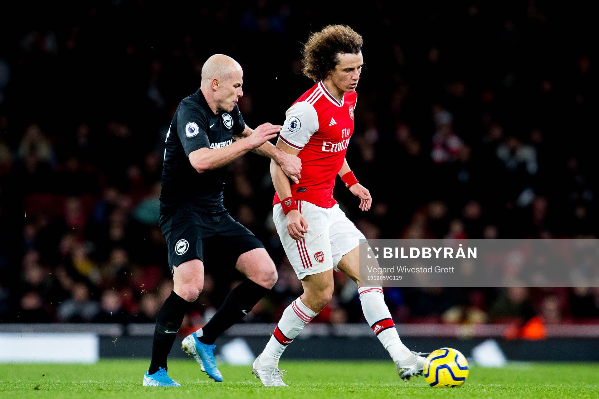 Aaron Mooy of Brighton and David Luiz of Arsenal during the Premier League football match between Arsenal and Brighton & Hove Albion on December 5, 2019 in London.