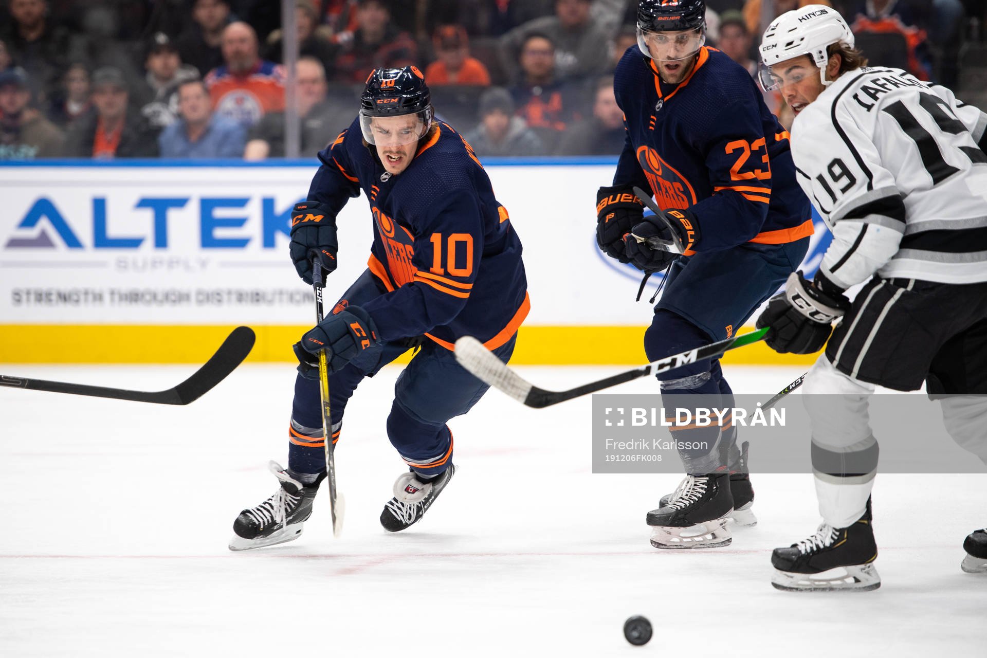 Joakim Nygard of the Edmonton Oilers and Alex Iafallo of