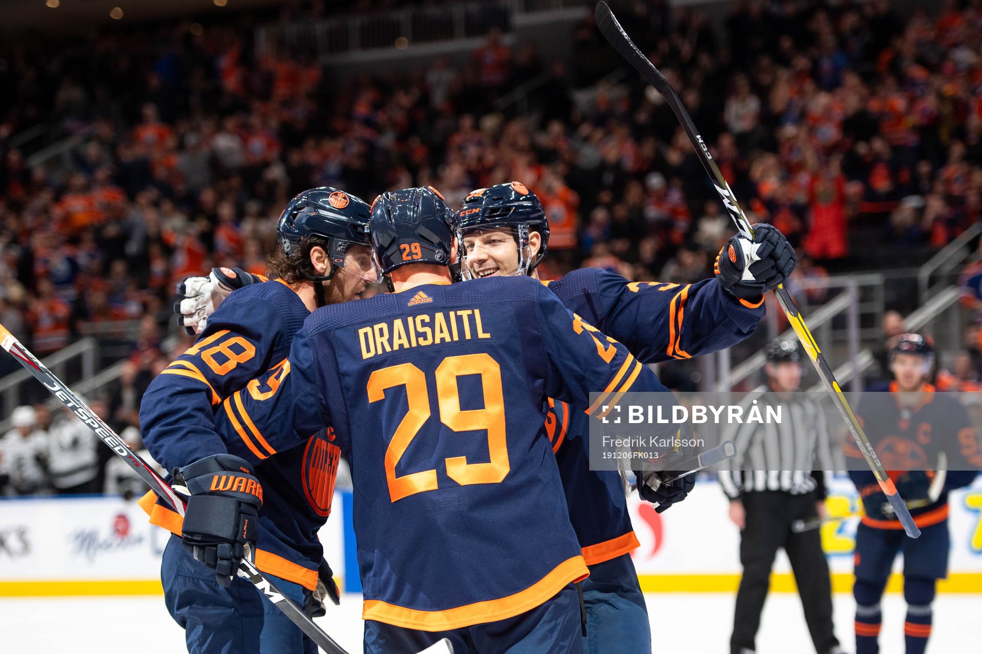 James Neal, Leon Draisaitl and Alex Chiasson celebrate