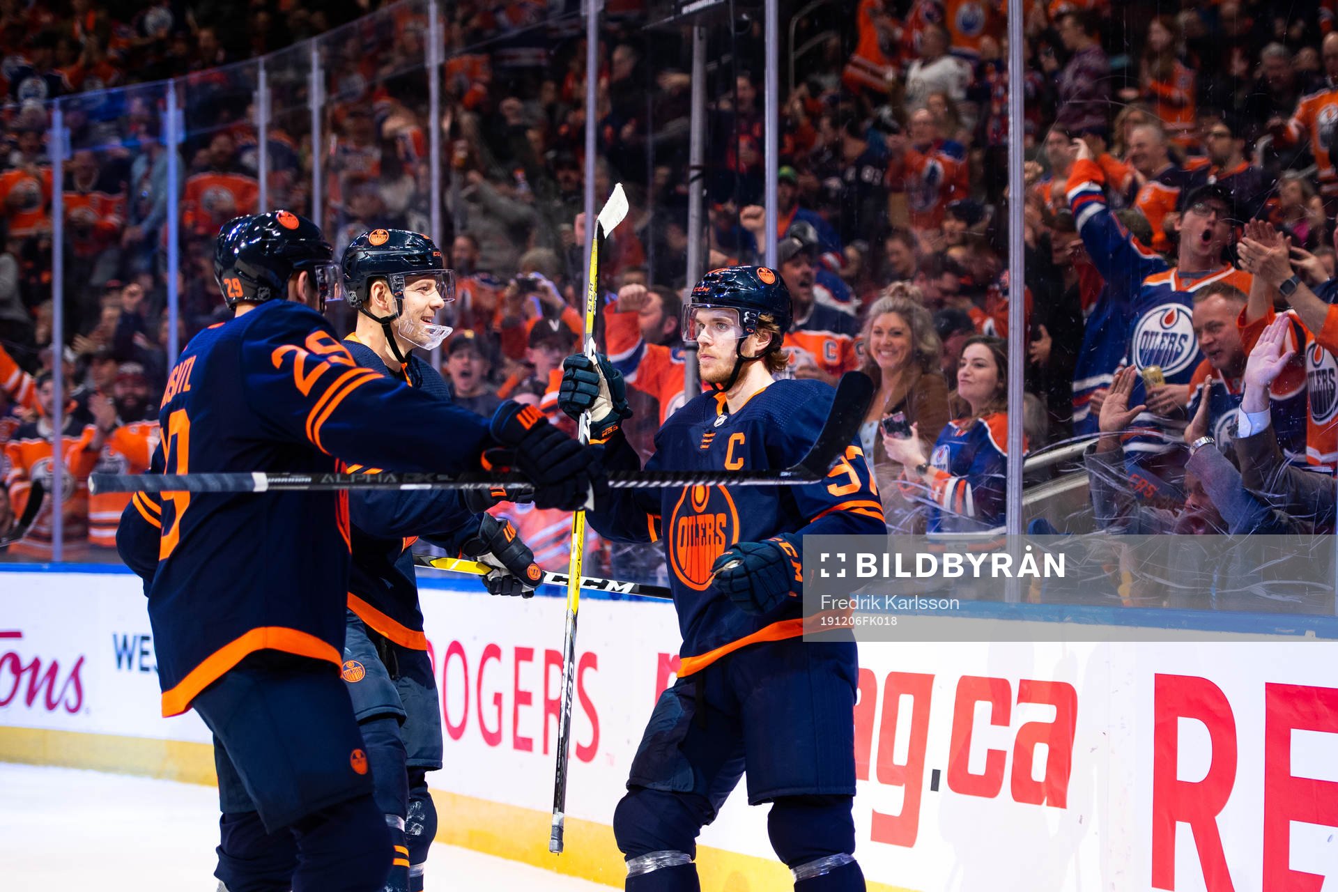 Leon Draisaitl, Alex Chiasson and Connor McDavid of the