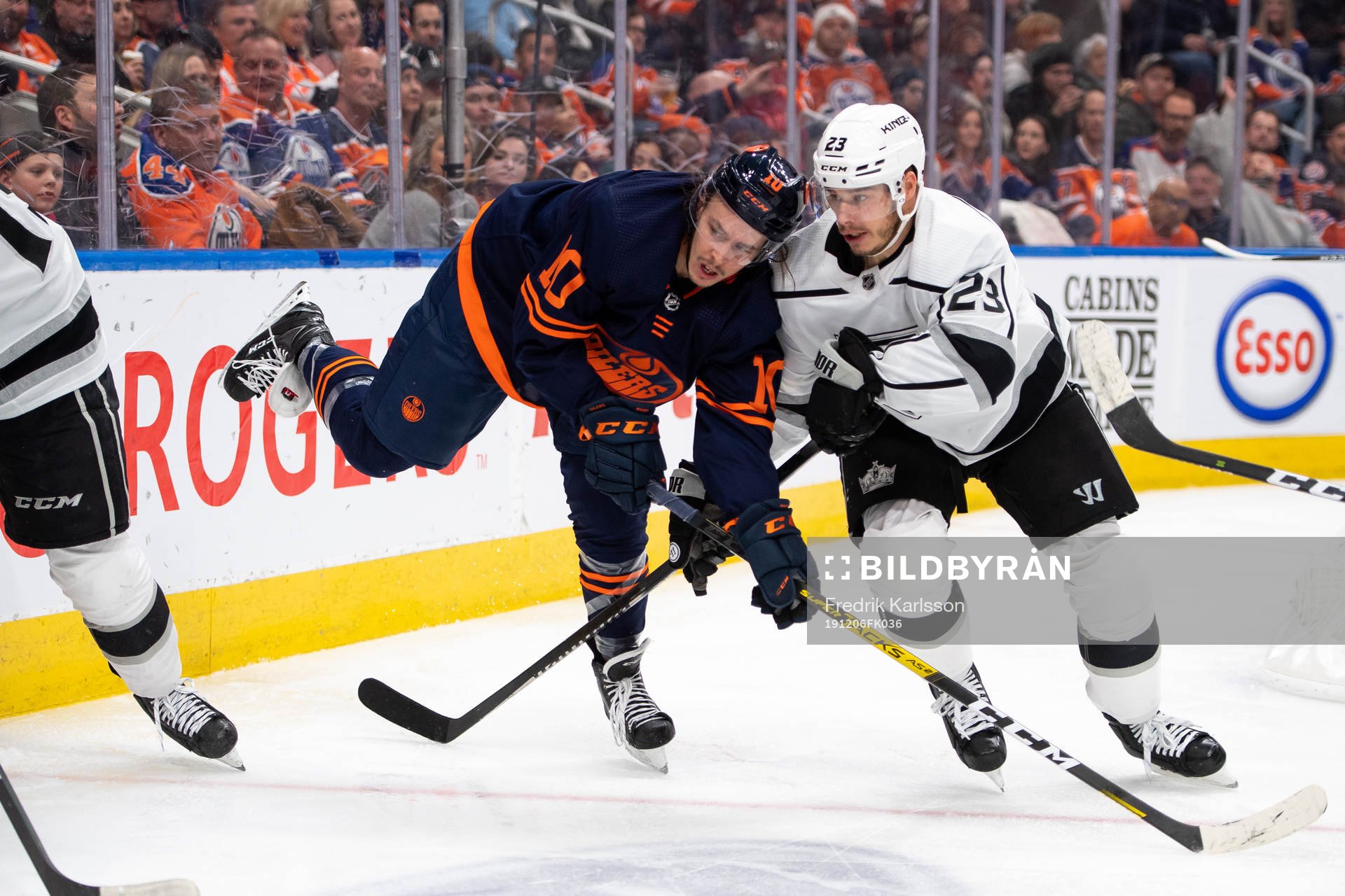 Joakim Nygard of the Edmonton Oilers and Dustin Brown of