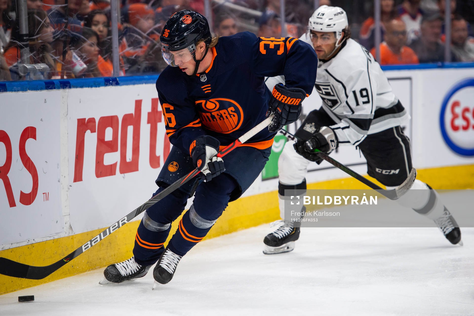 Joel Persson of the Edmonton Oilers and Alex Iafallo of the