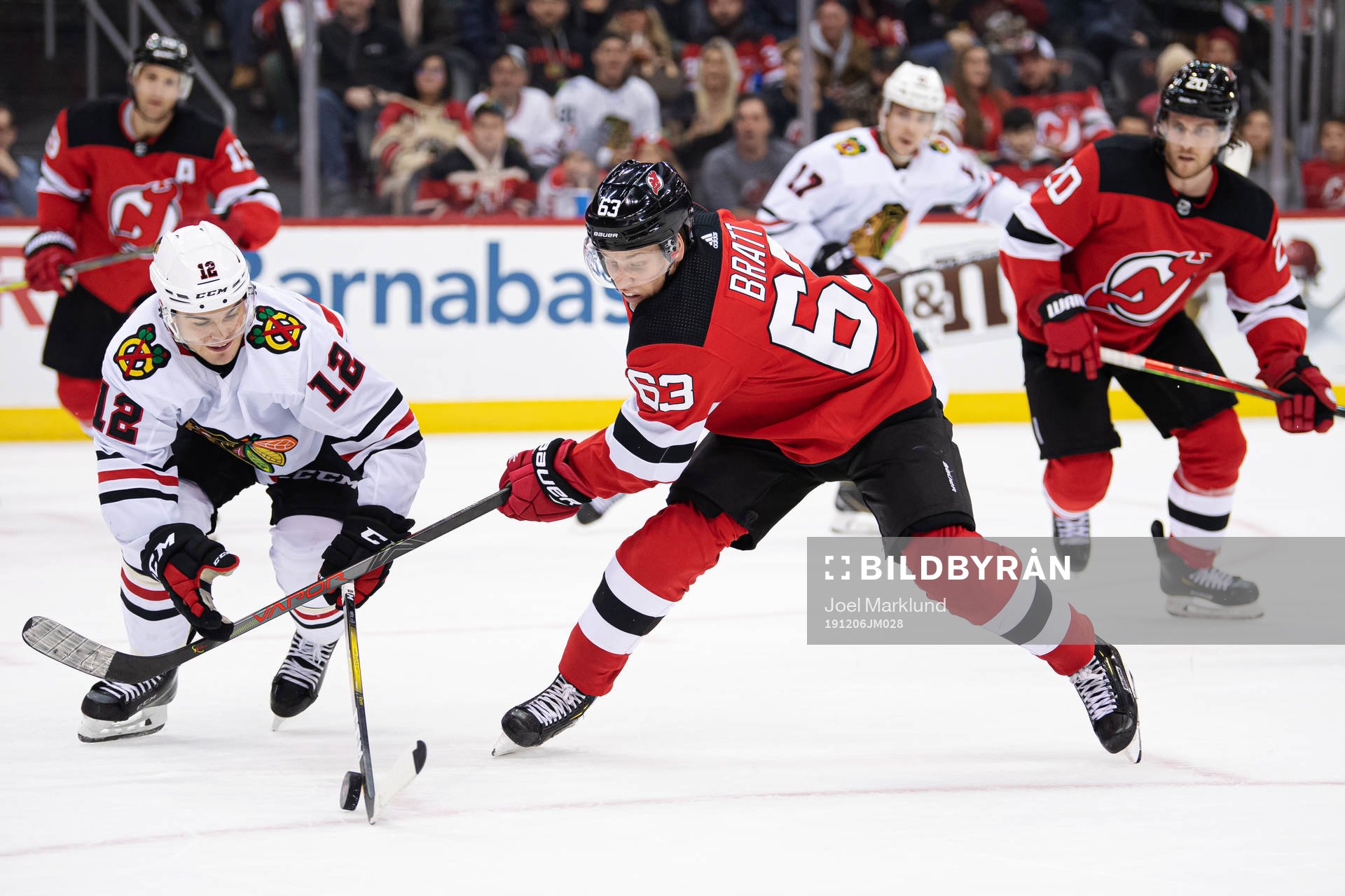 Chicago Blackhawks Alex DeBrincat and New Jersey Devils