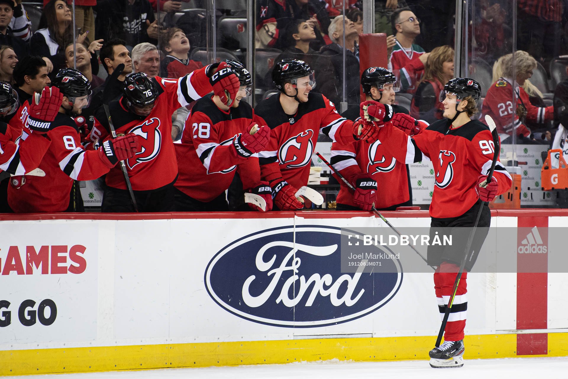 New Jersey Devils Jesper Boqvist celebrates with teammates